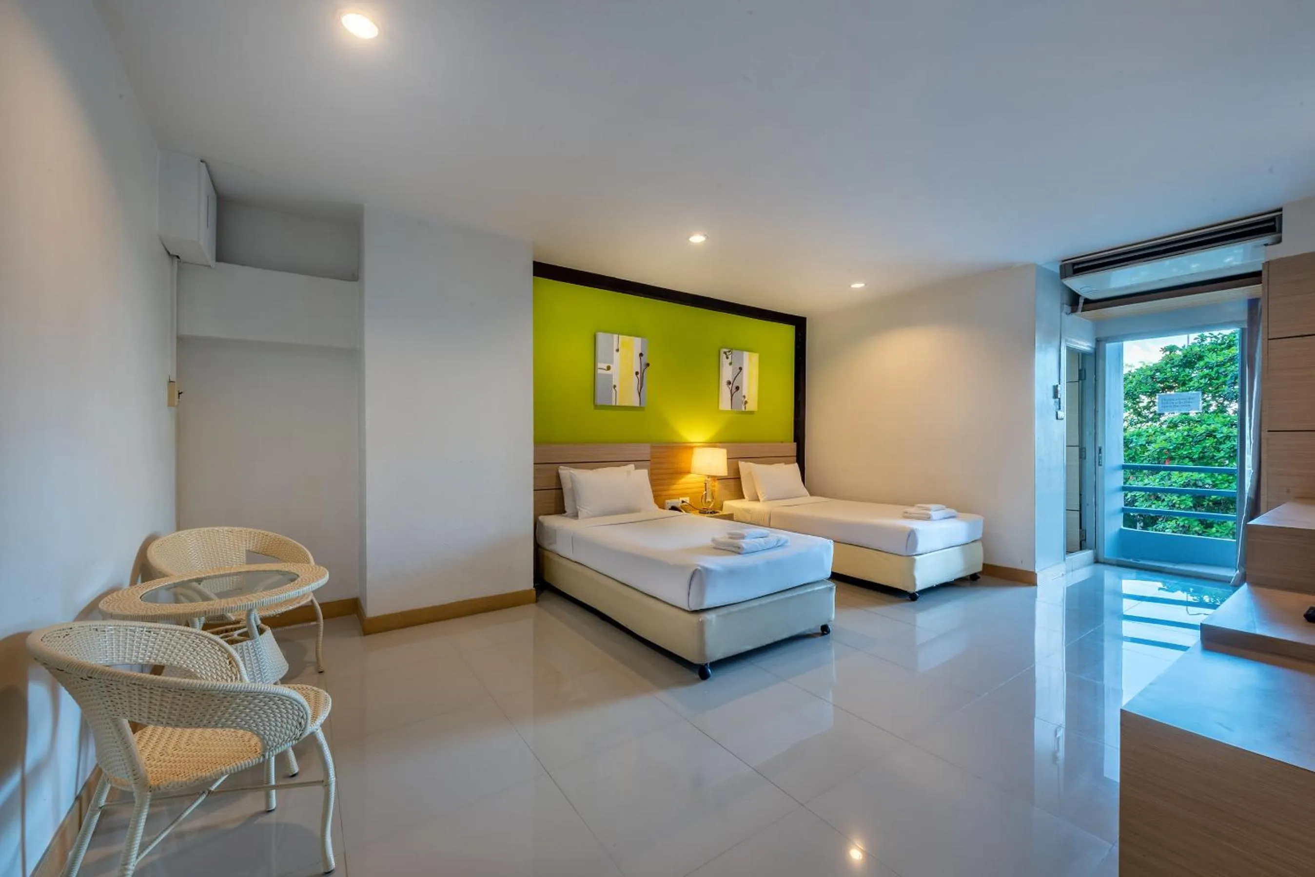 Bed in The Legacy Convention Hotel