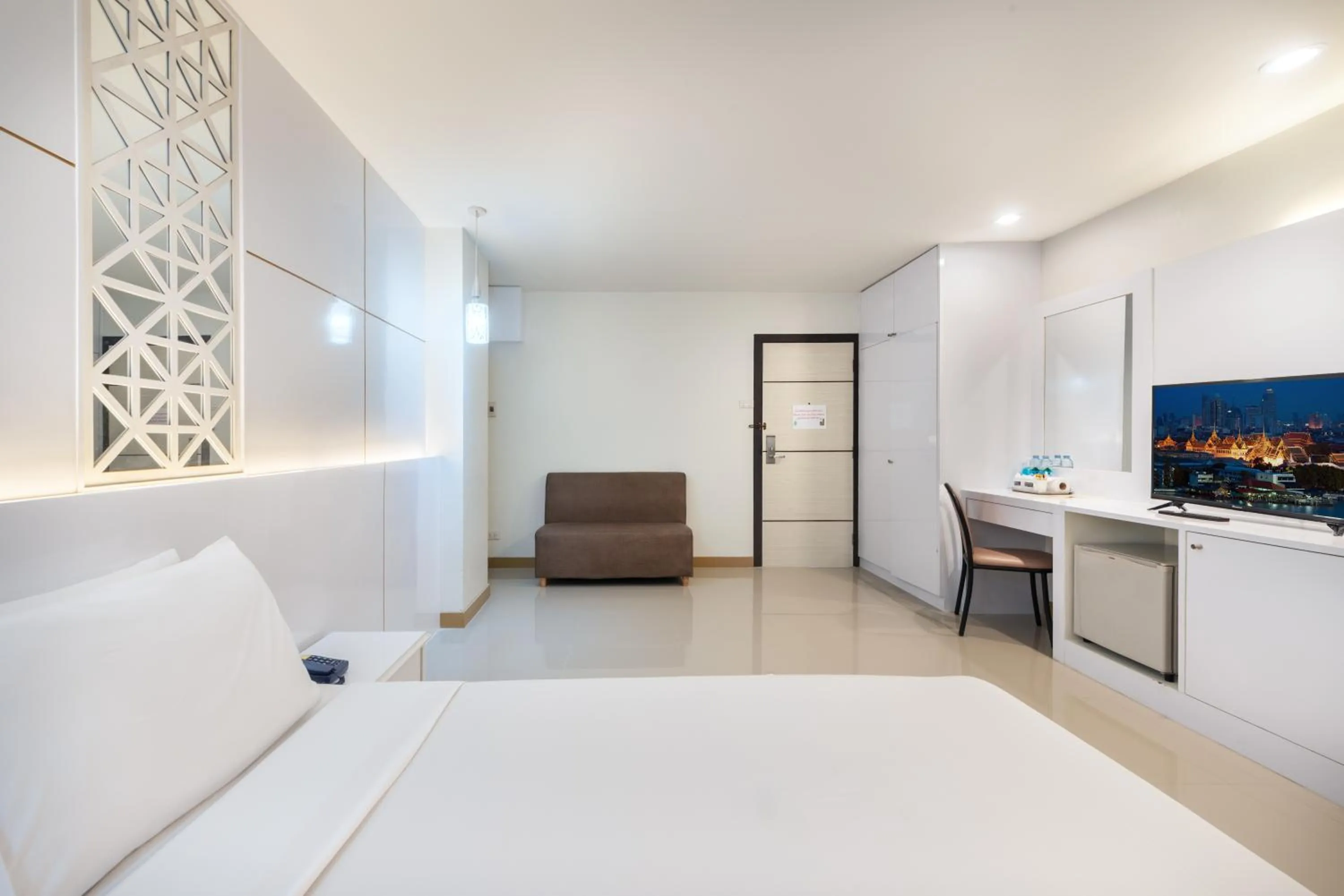 Bed in The Legacy Convention Hotel