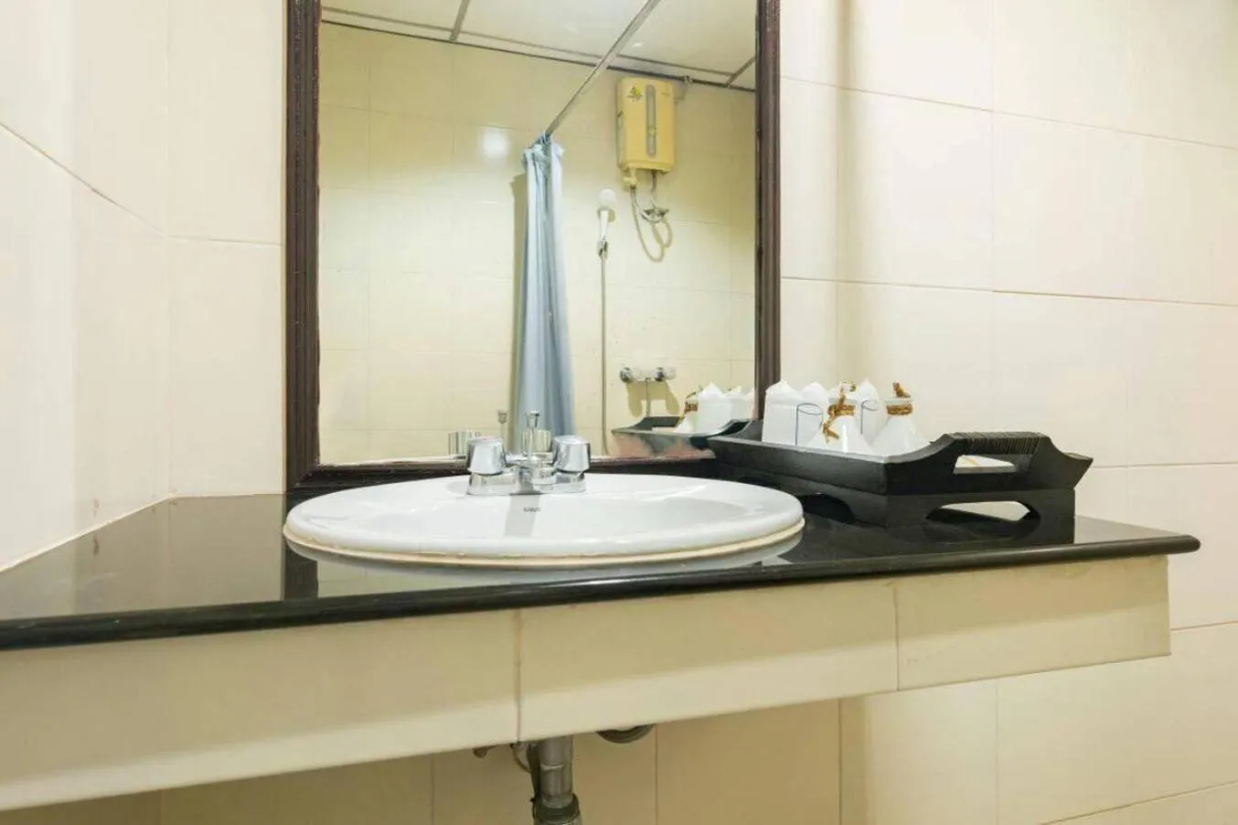 Bathroom in The Legacy Convention Hotel