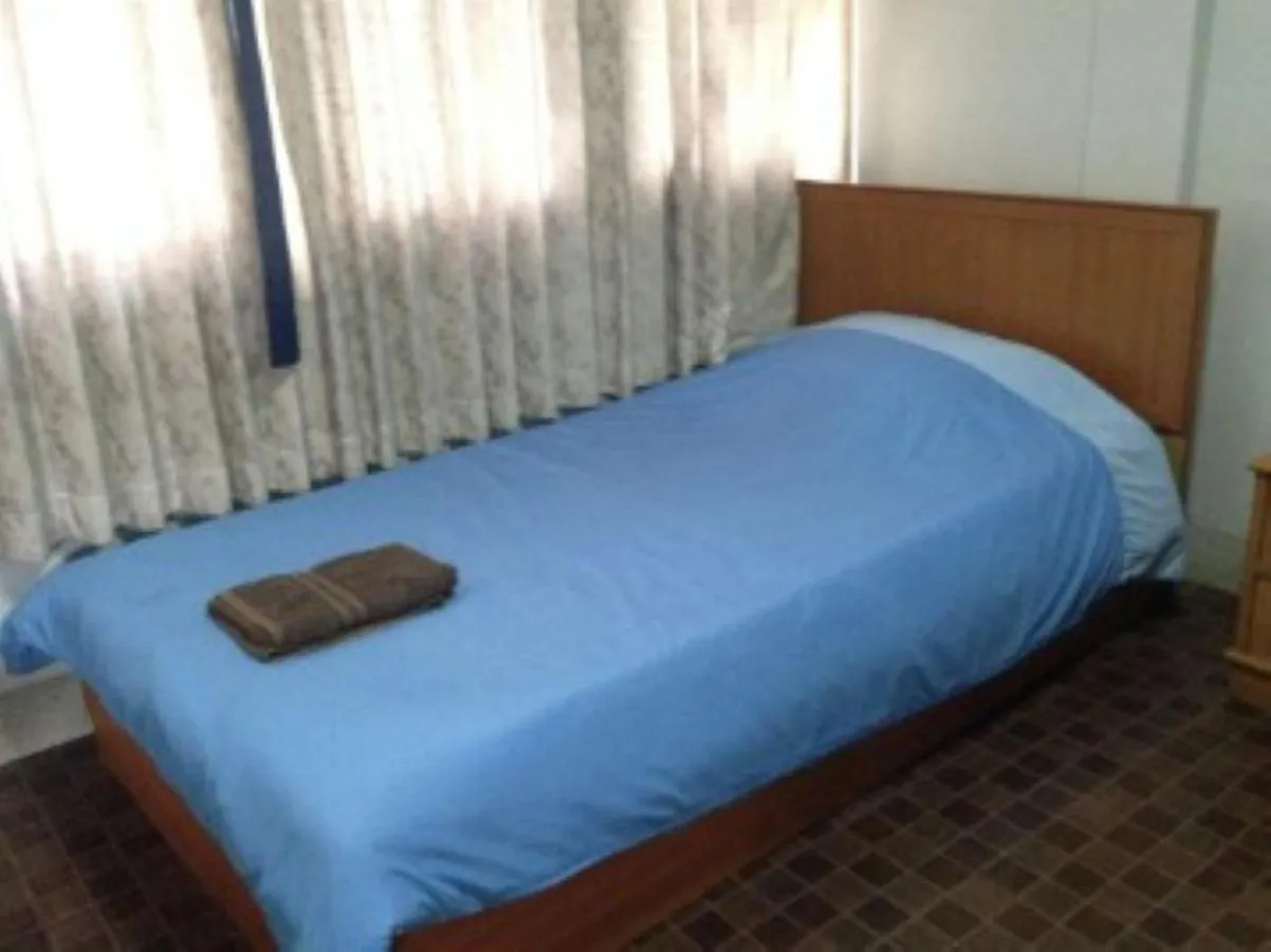 Bed in White Orchid Inn I