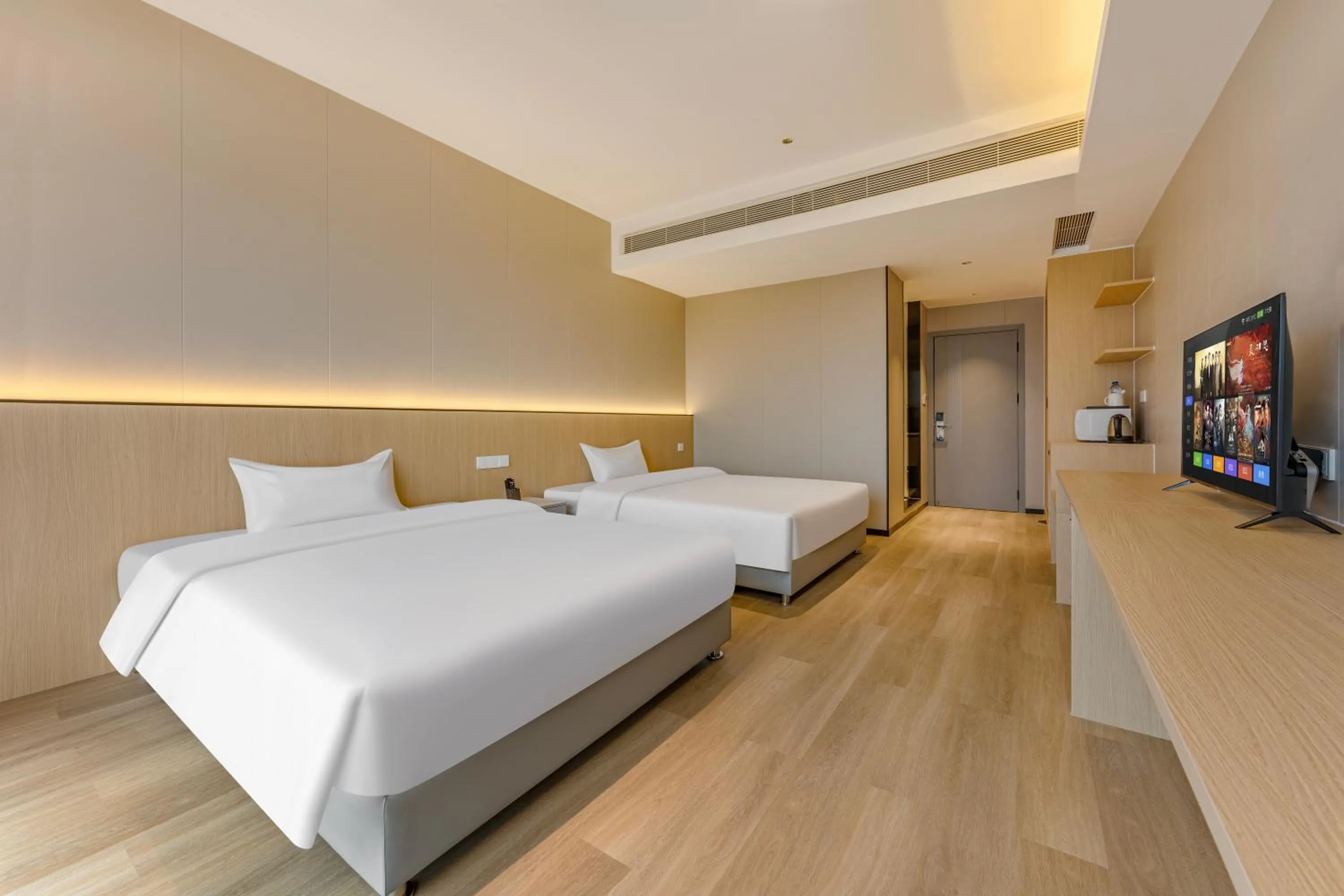 Communal lounge/ TV room, Bed in HeeFun Apartment GZ -Poly World Trading Center