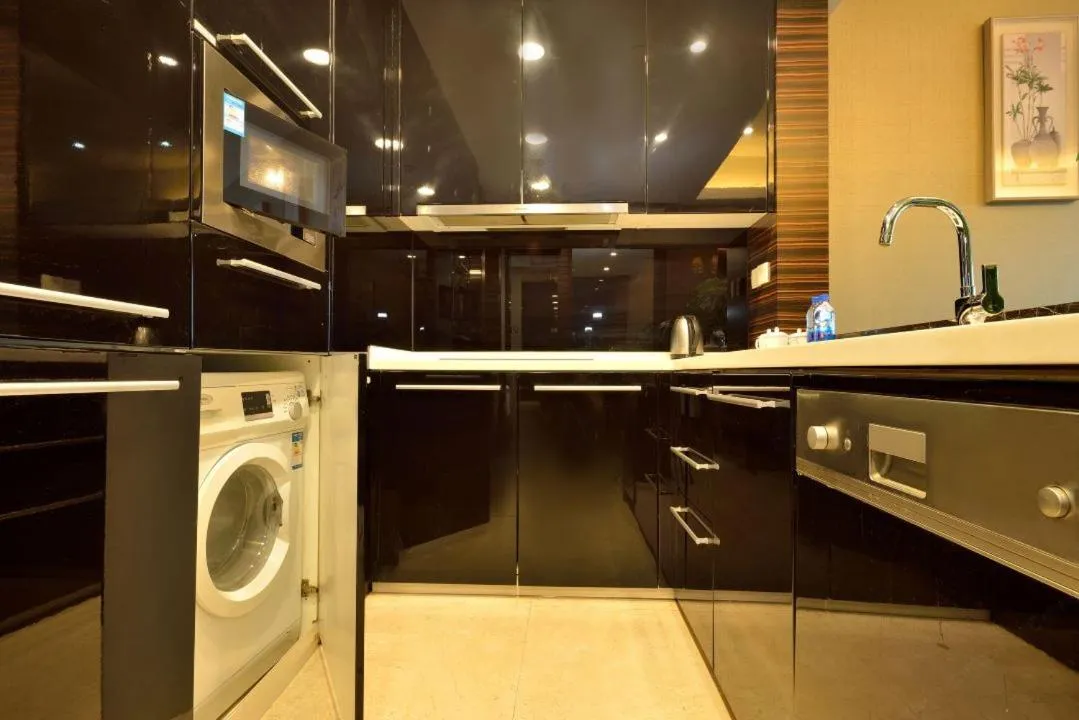 Kitchen or kitchenette in HeeFun Apartment GZ -Poly World Trading Center