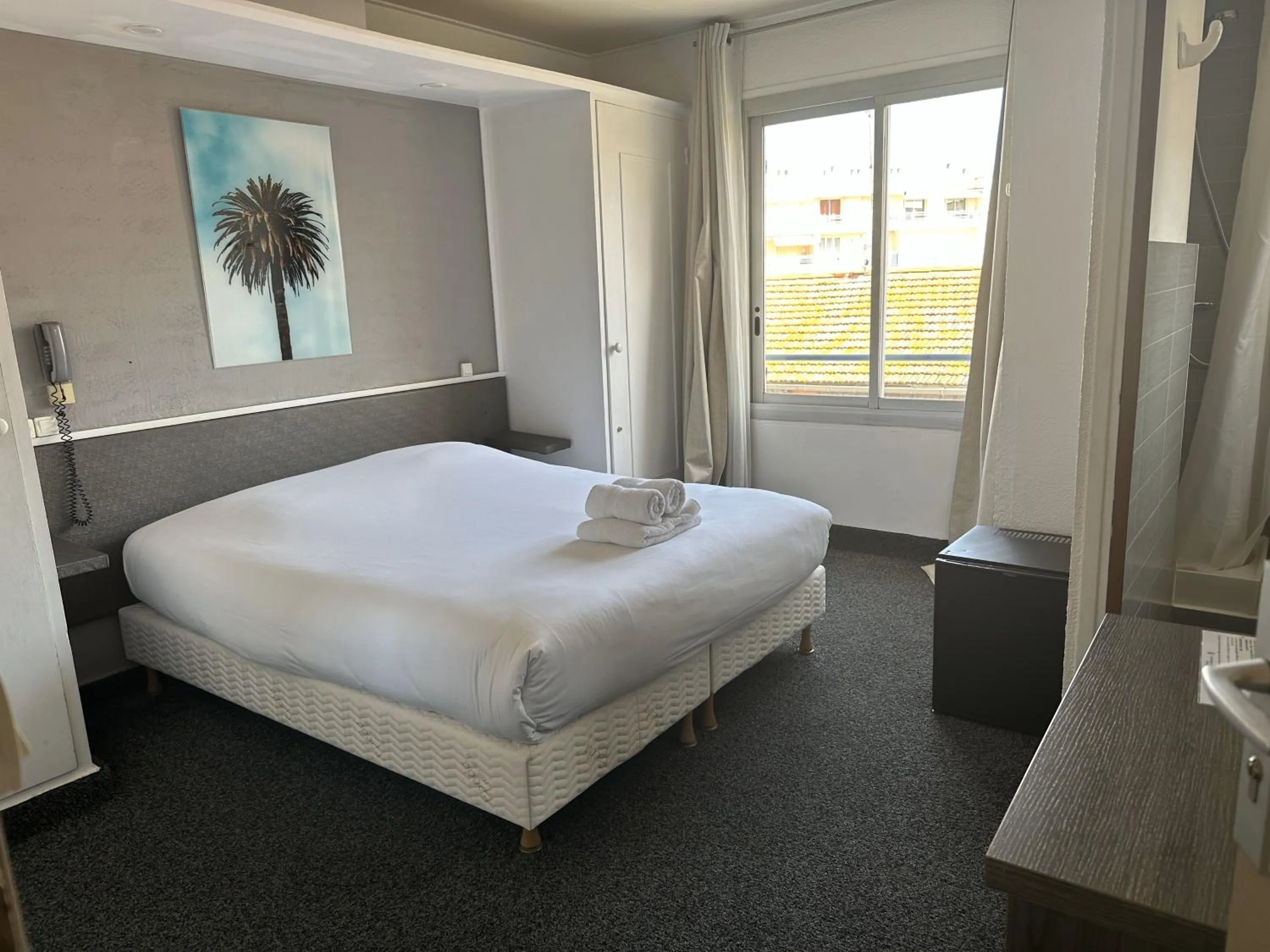 Bed in Hôtel le Chardon Bleu