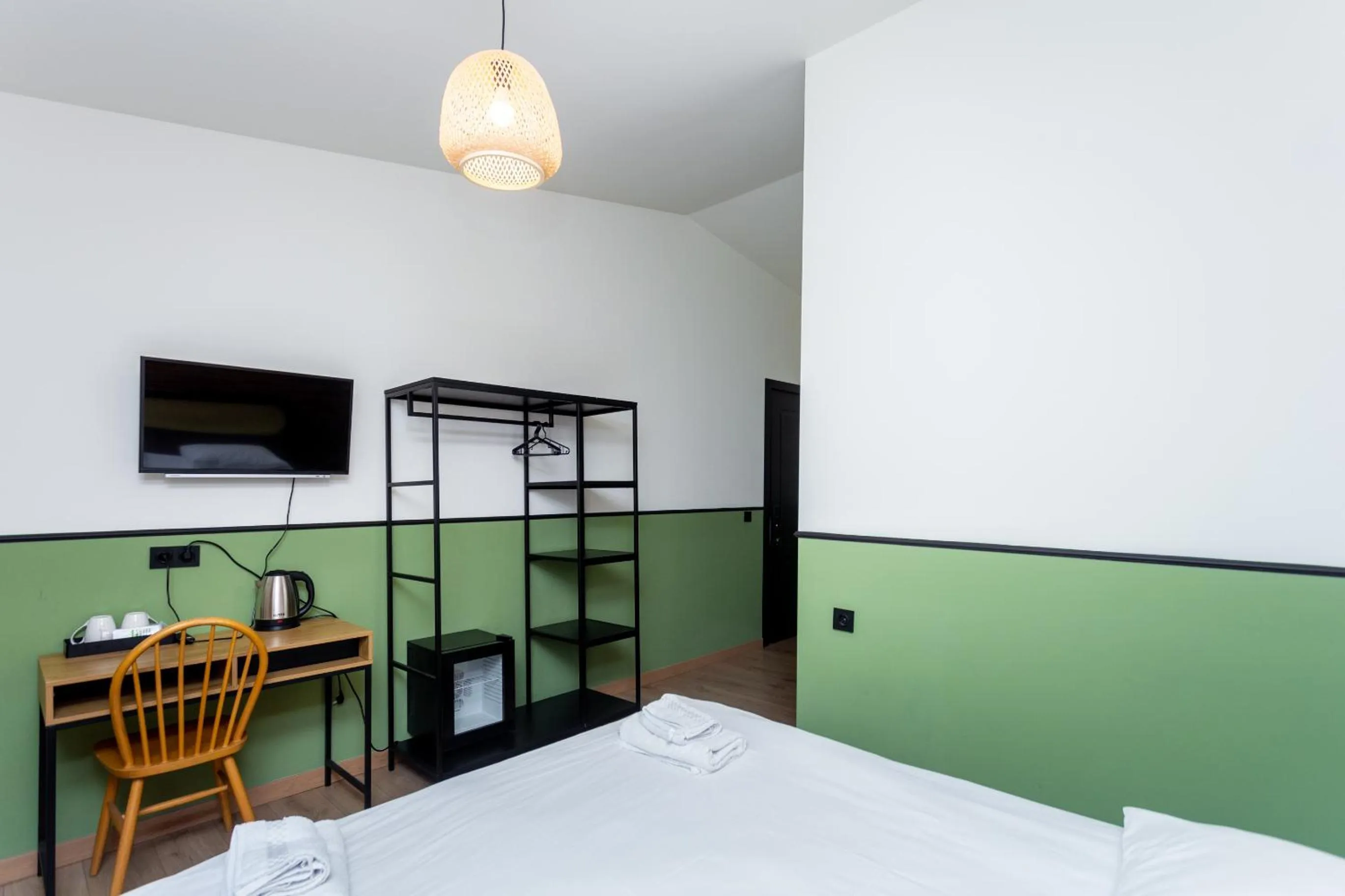 Bed in Shota Rustaveli Aparthotel