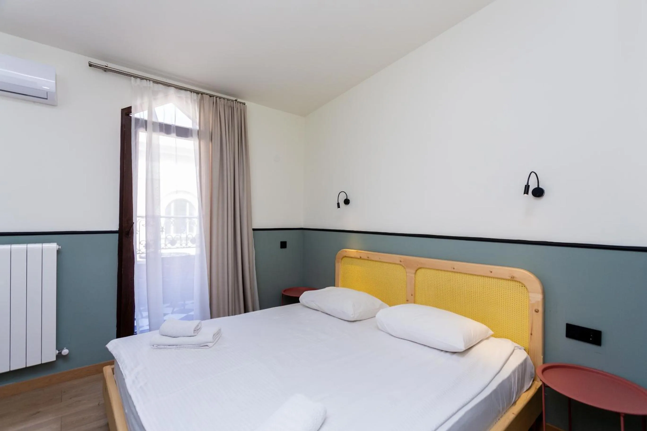 Bed in Shota Rustaveli Aparthotel