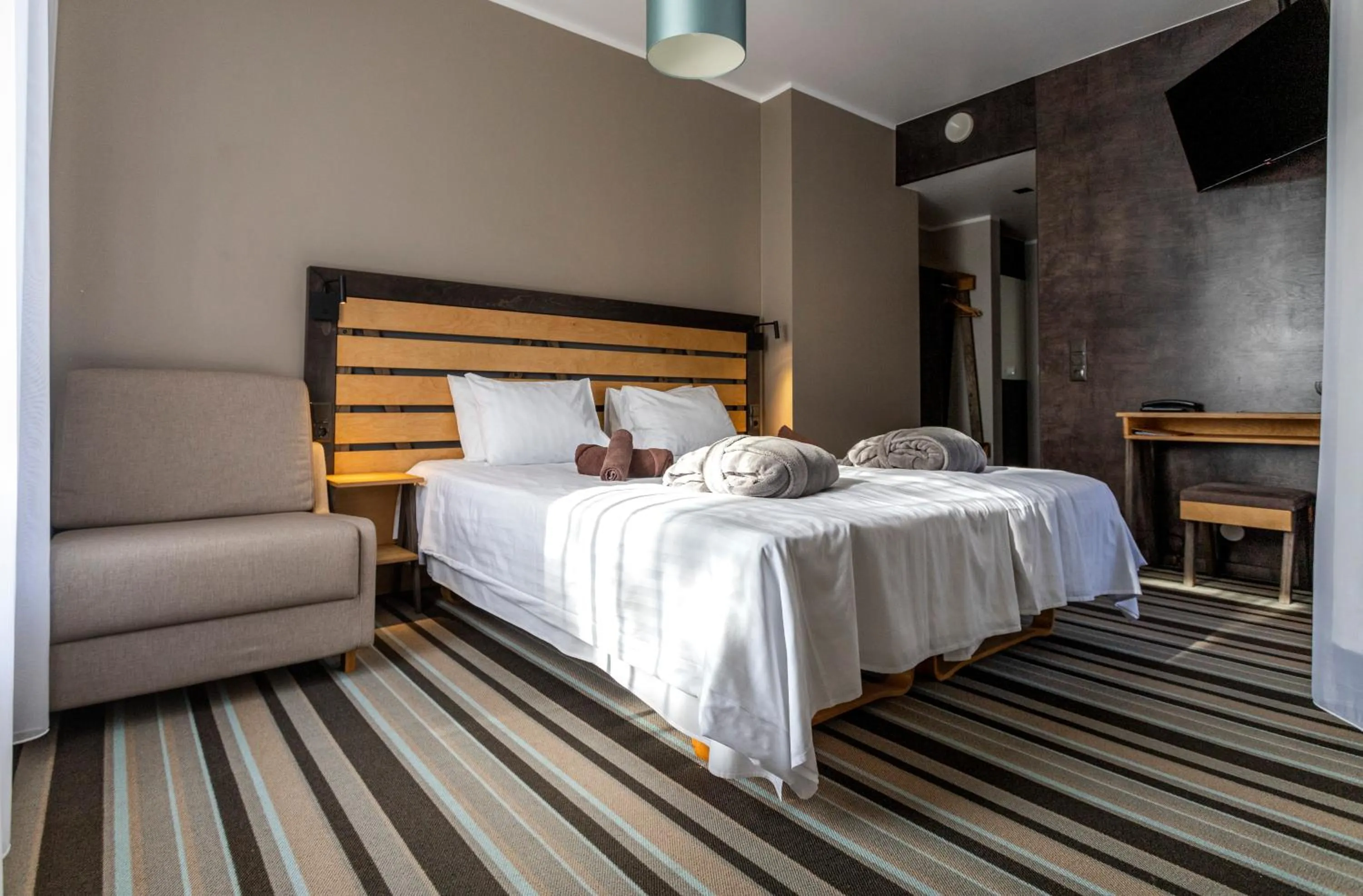 Bed in Johan Design & SPA Hotel