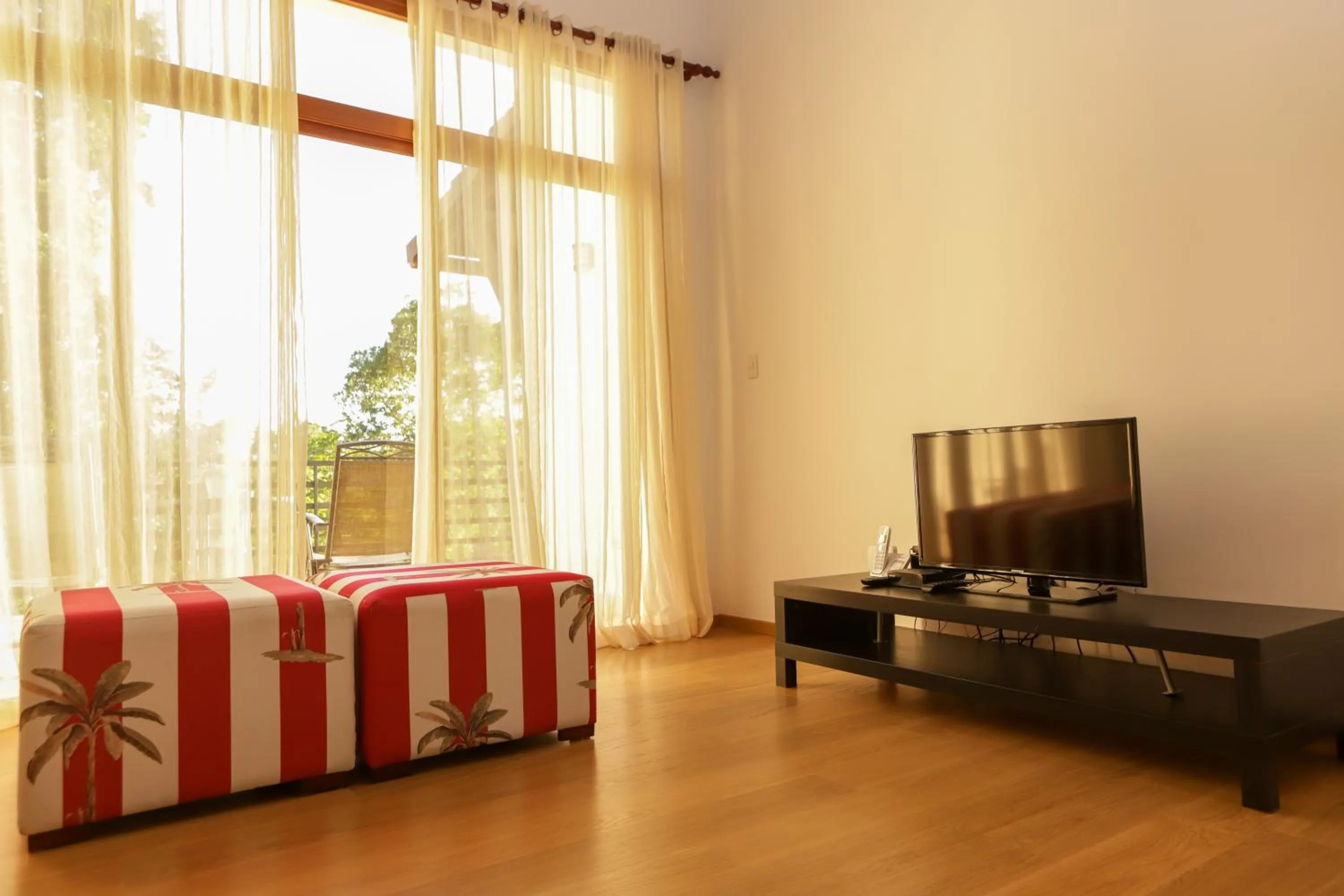 Bed in Sybaris Suites & Residences