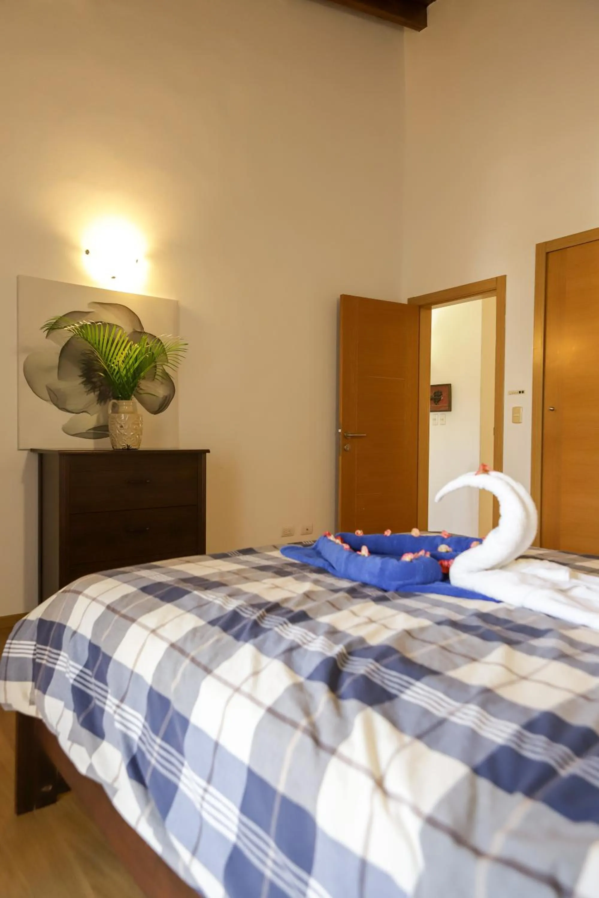 Bed in Sybaris Suites & Residences