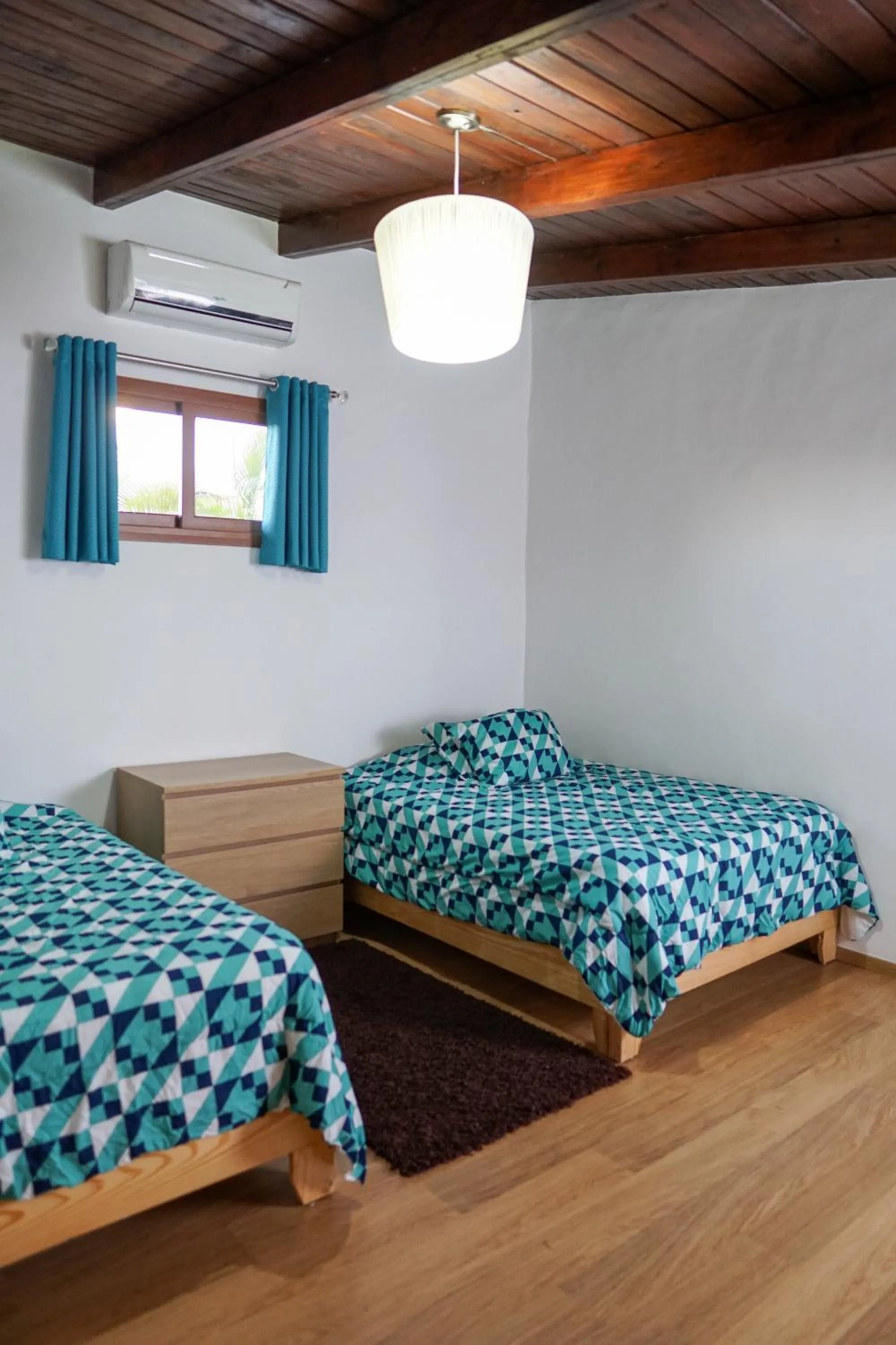 Bed in Sybaris Suites & Residences