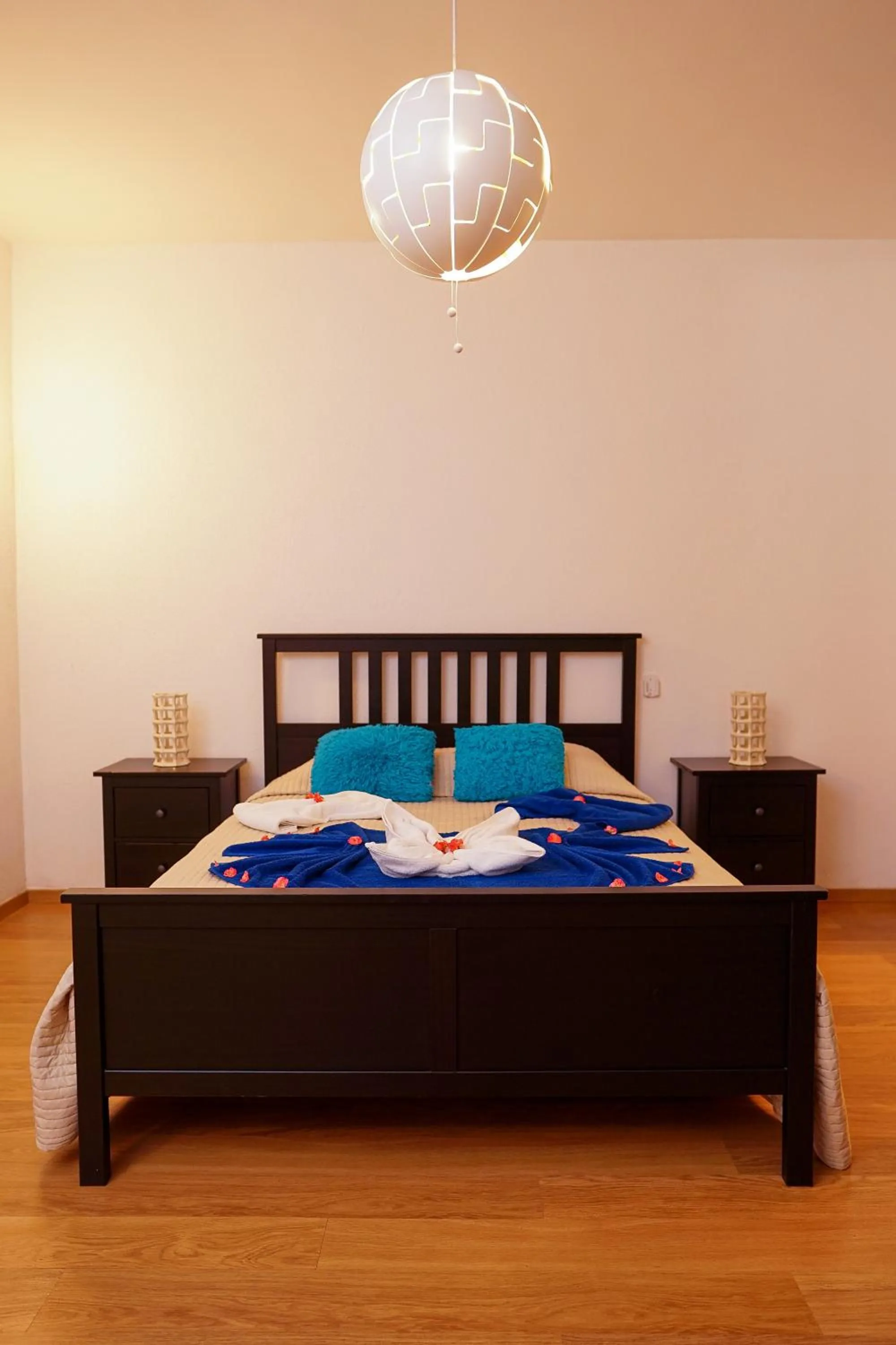 Bed in Sybaris Suites & Residences