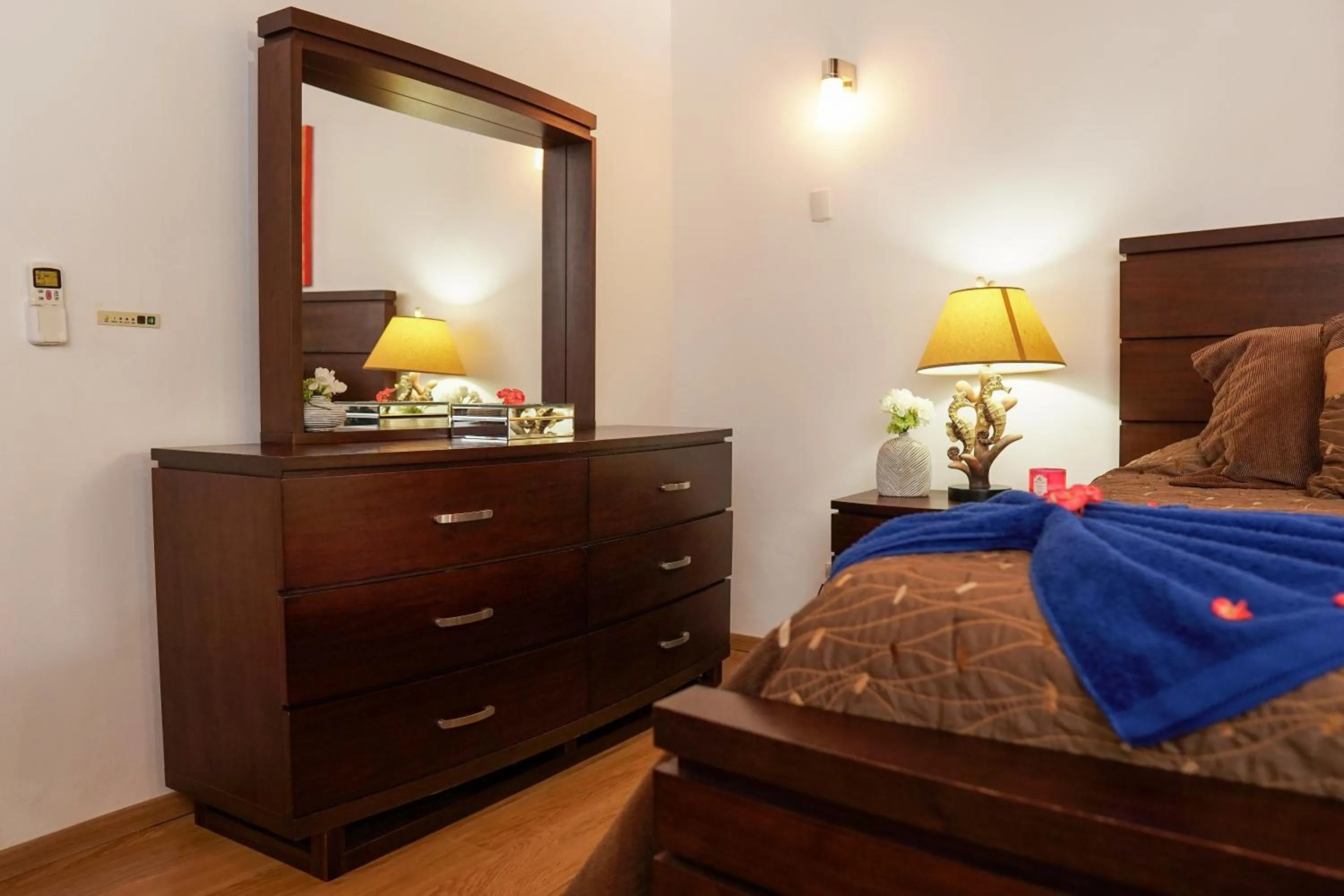 Bed in Sybaris Suites & Residences