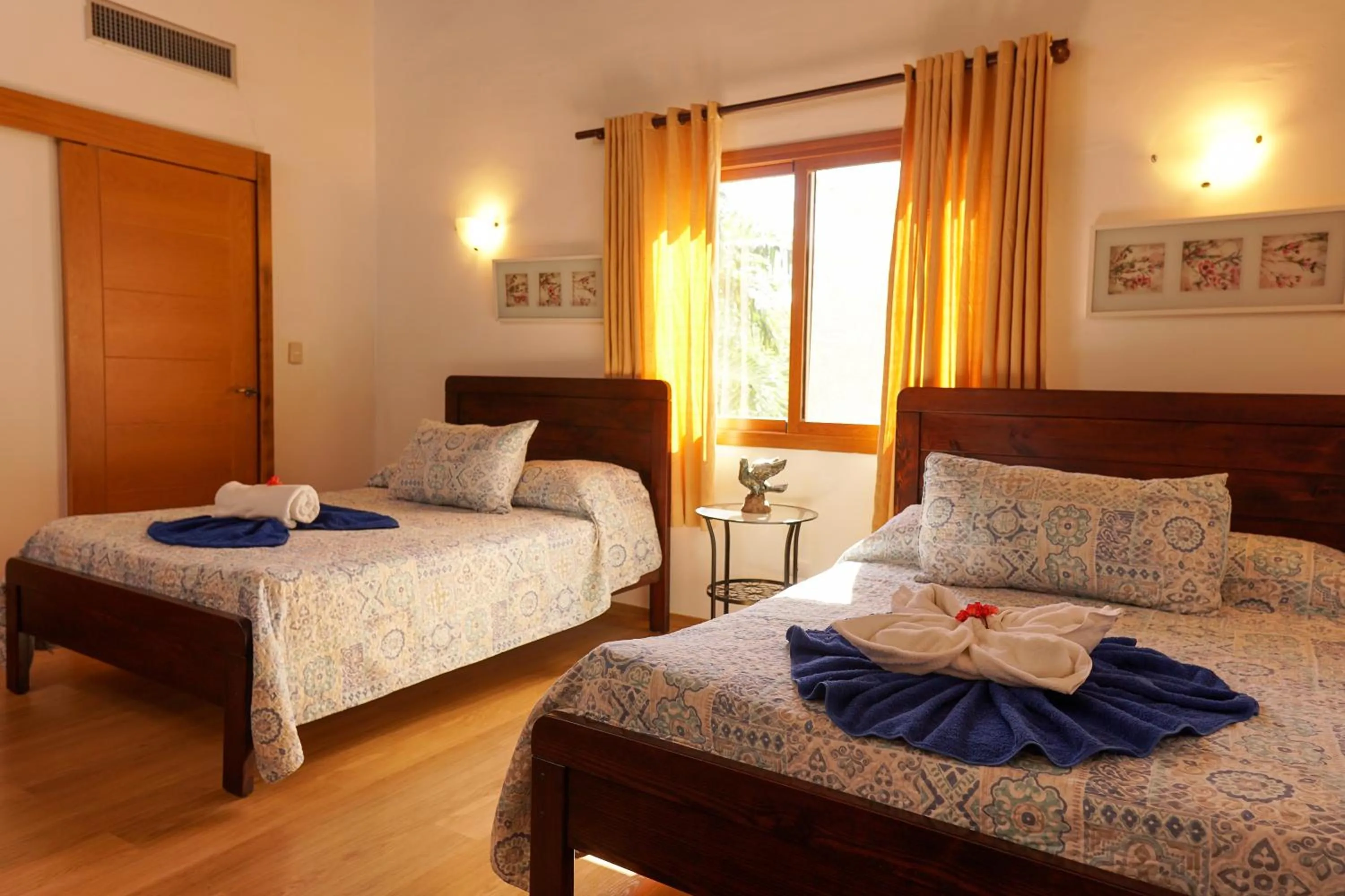 Bed in Sybaris Suites & Residences