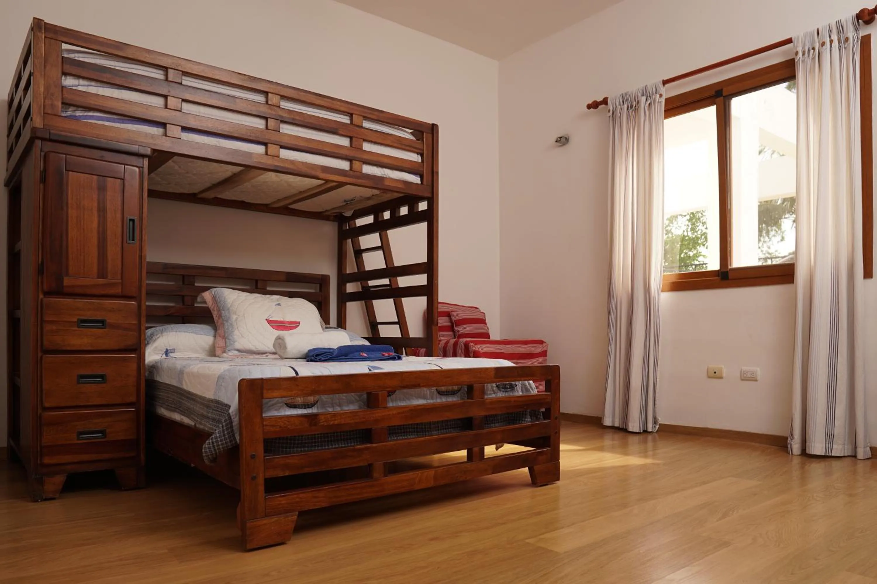 Bed in Sybaris Suites & Residences