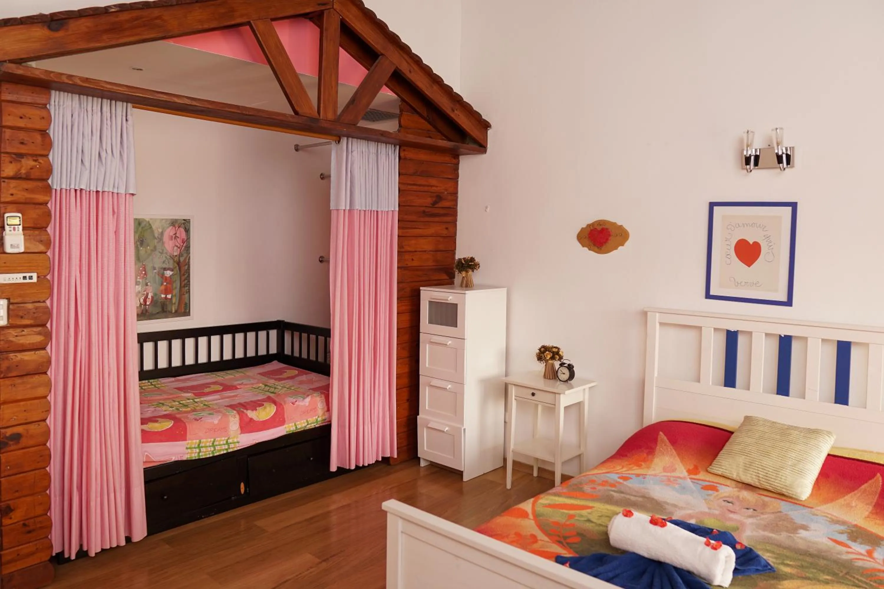 Bed in Sybaris Suites & Residences