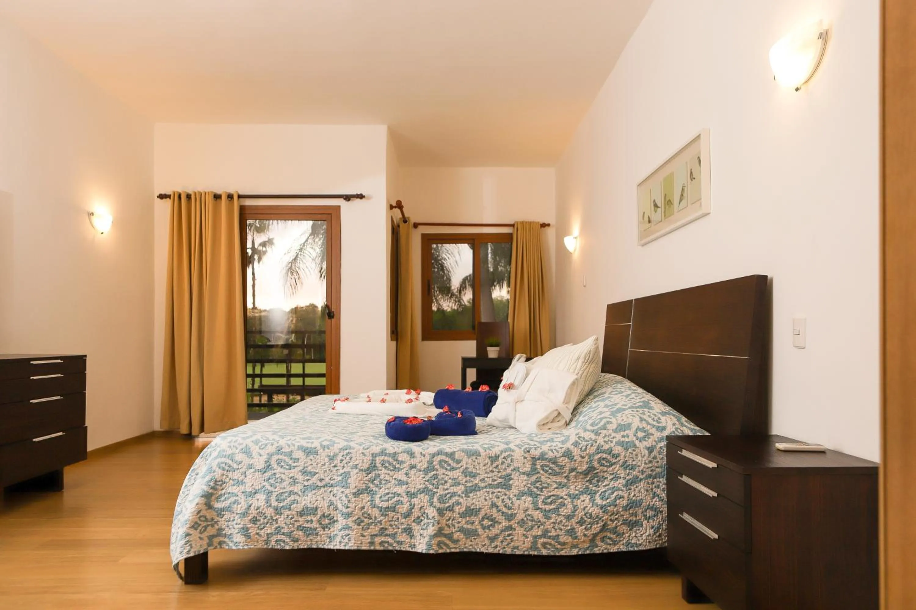 Bed in Sybaris Suites & Residences