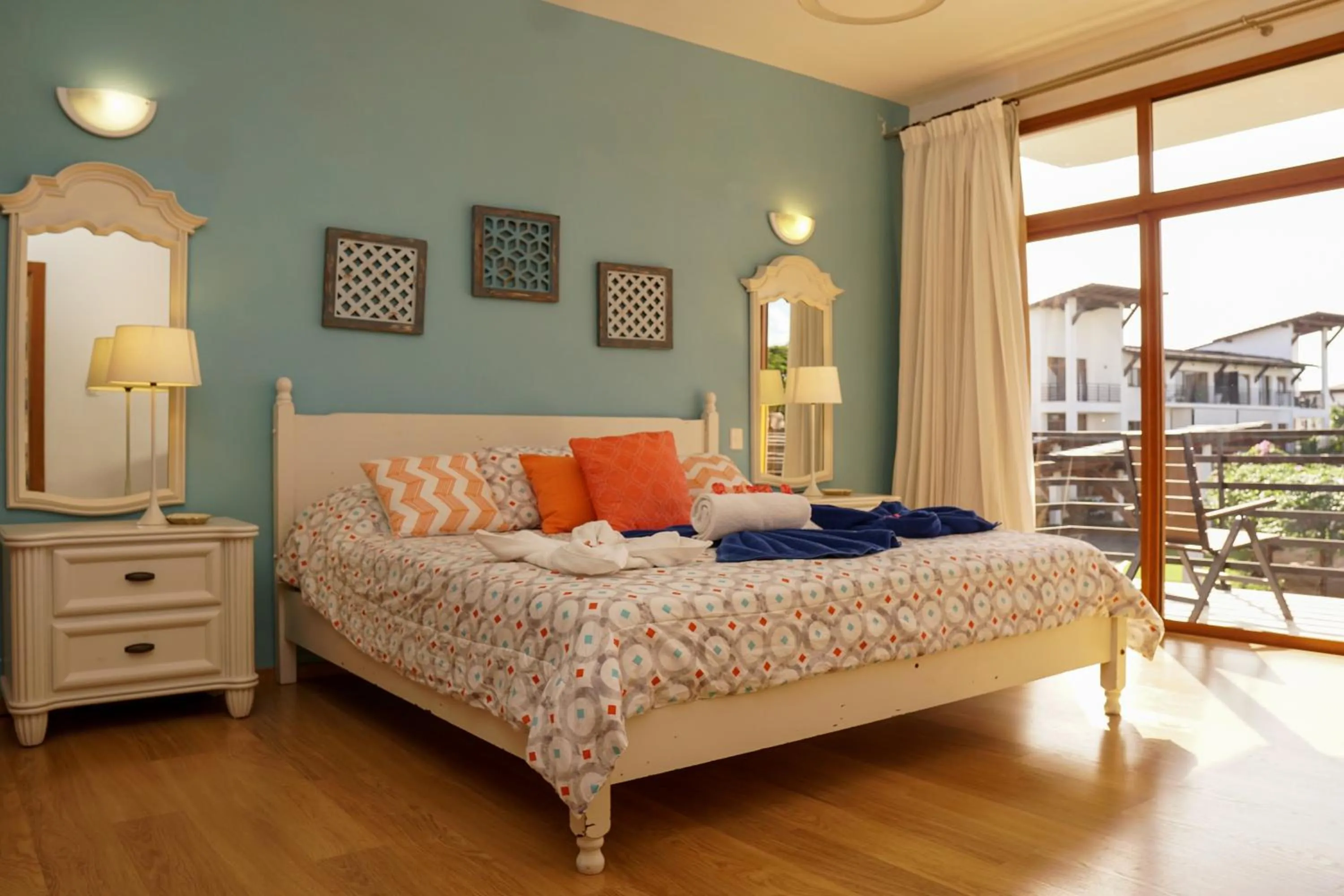 Bed in Sybaris Suites & Residences