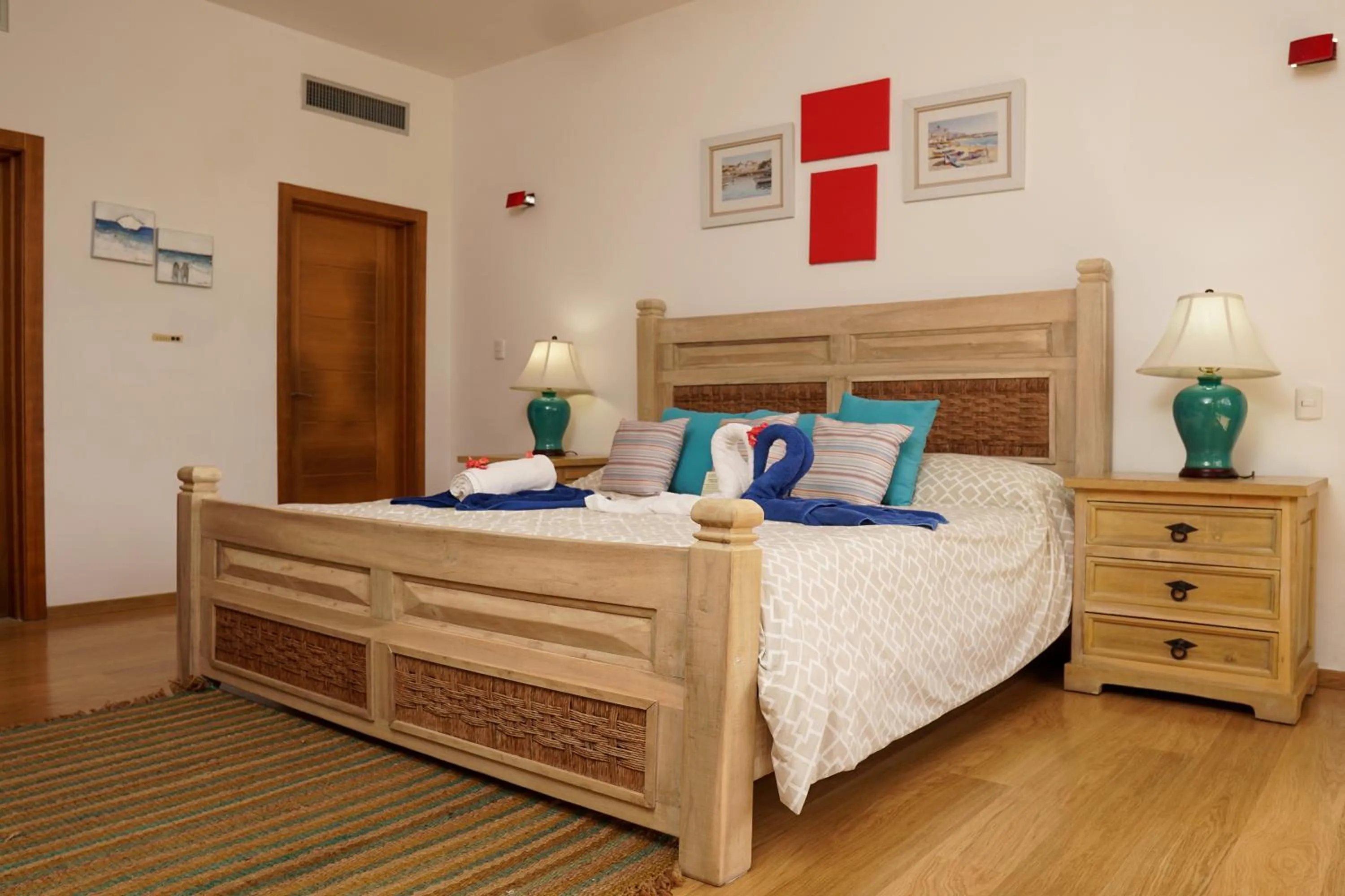 Bed in Sybaris Suites & Residences