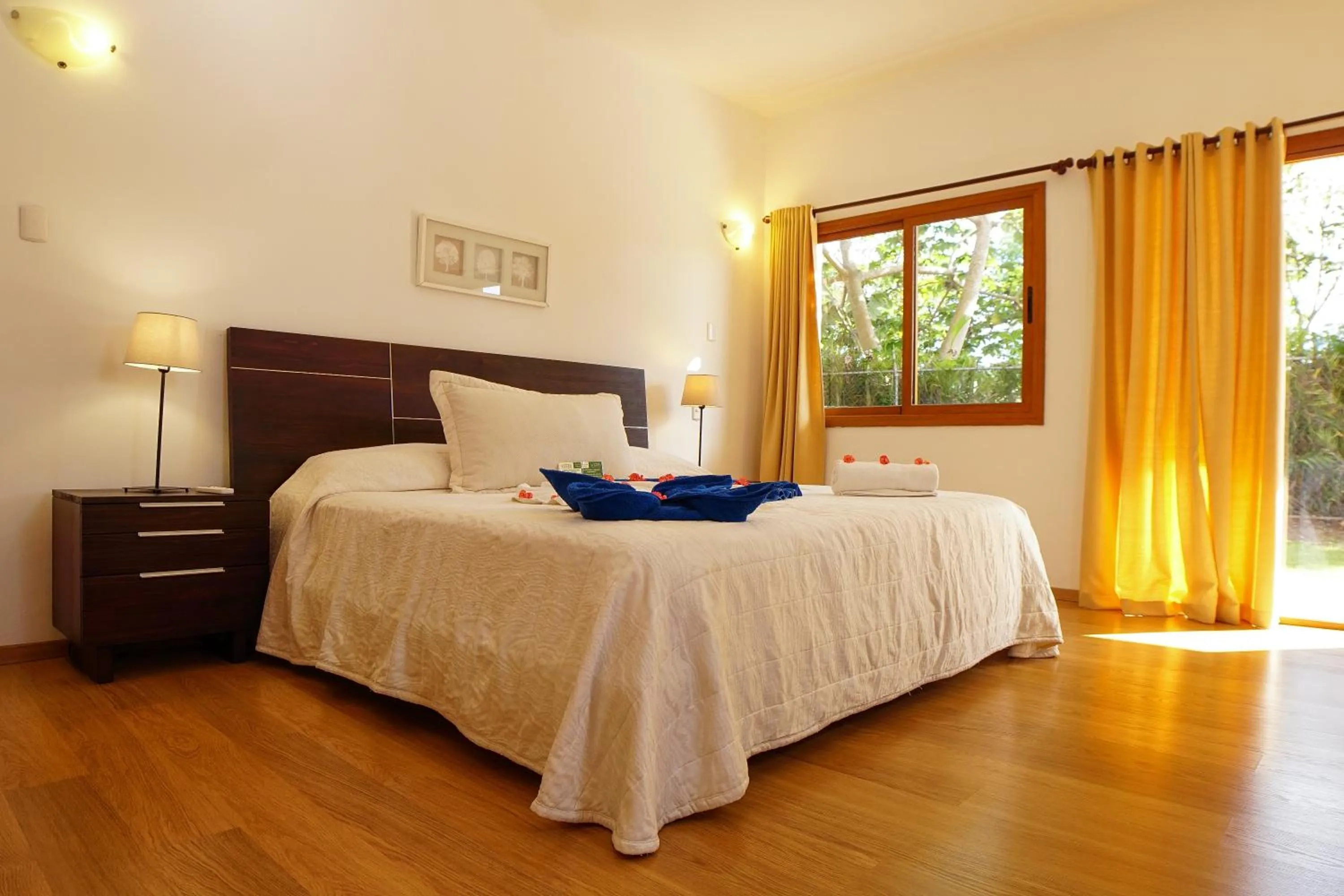 Bed in Sybaris Suites & Residences