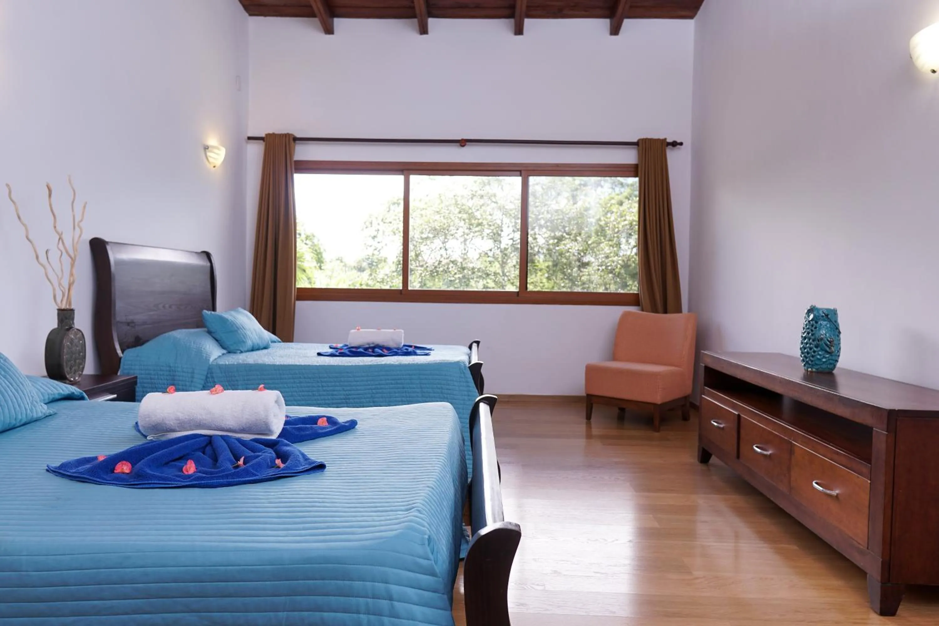 Bed in Sybaris Suites & Residences