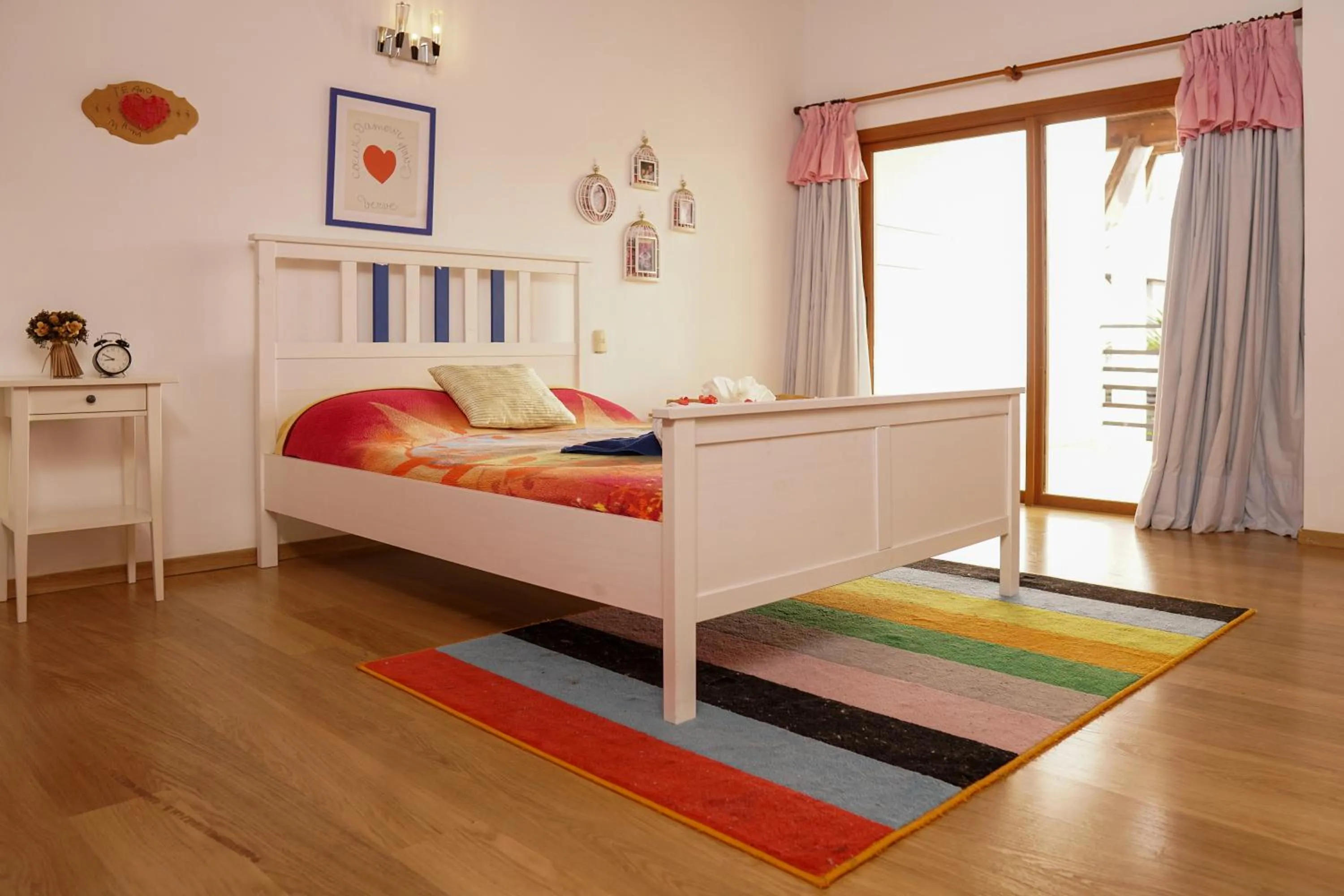 Bed in Sybaris Suites & Residences