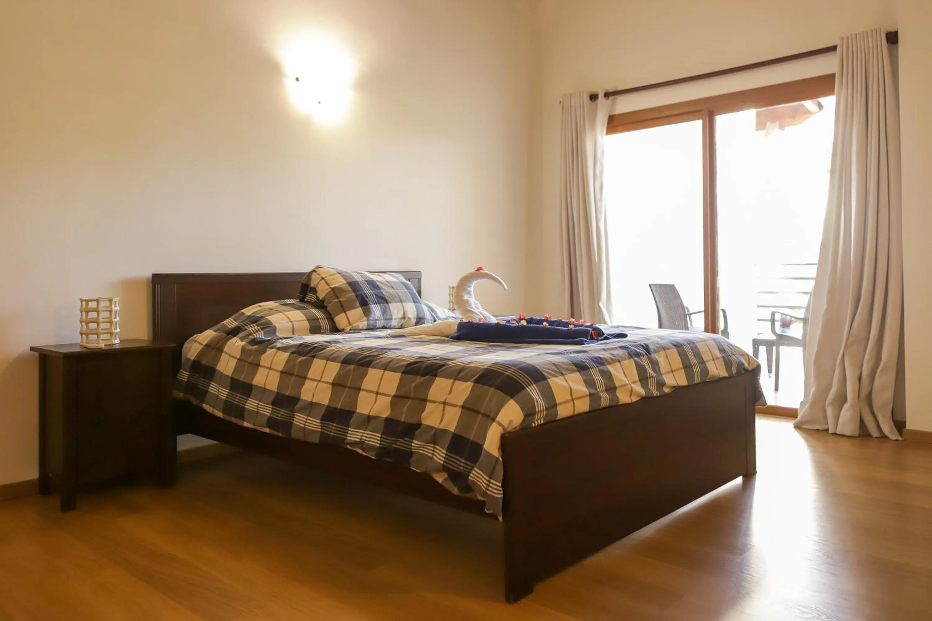 Bed in Sybaris Suites & Residences