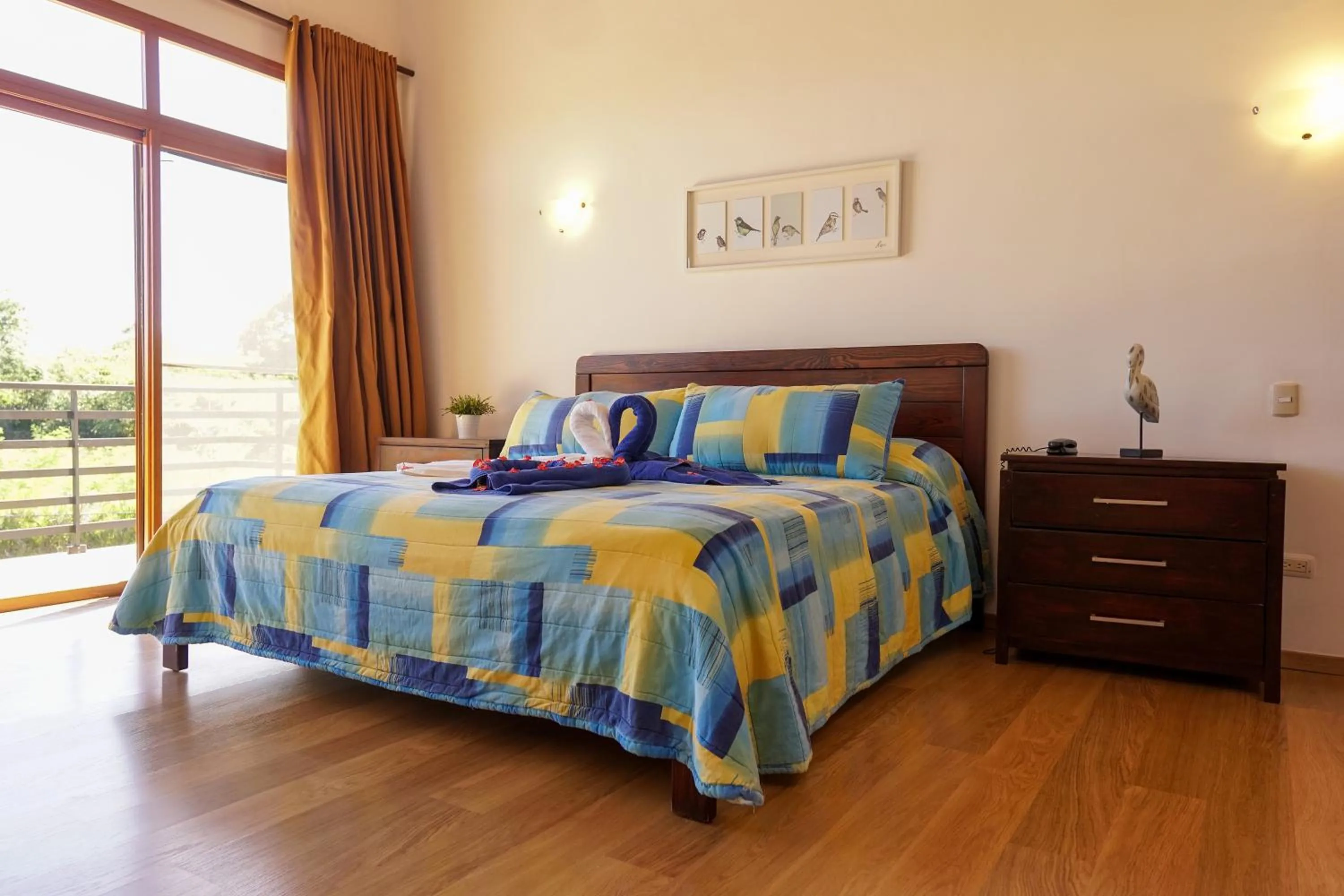 Bed in Sybaris Suites & Residences