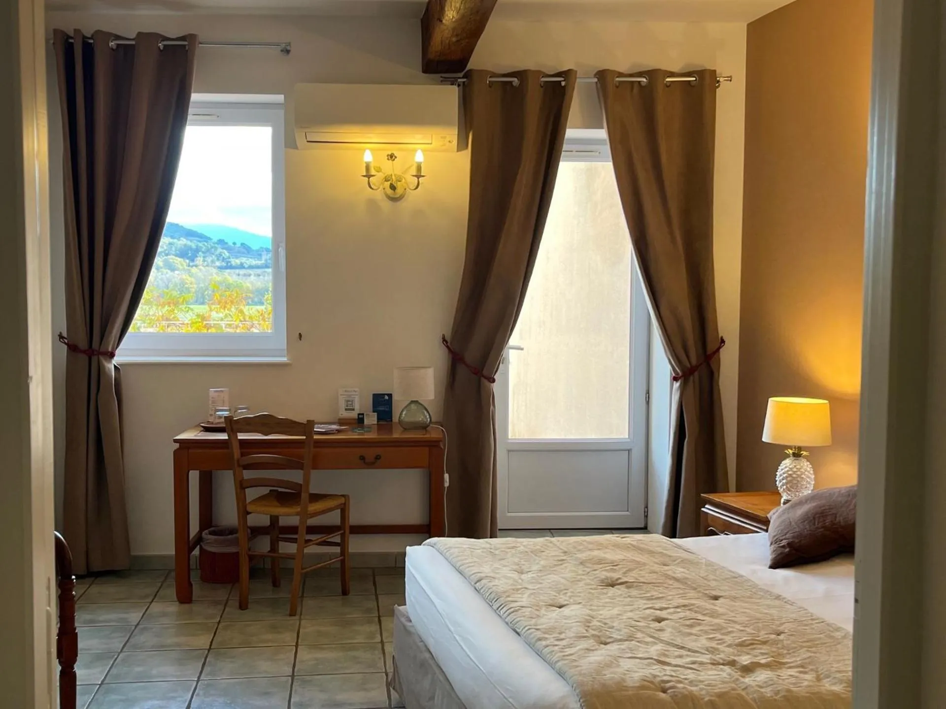 Photo of the whole room, Bed in Logis Hôtel La Bastide des Monges