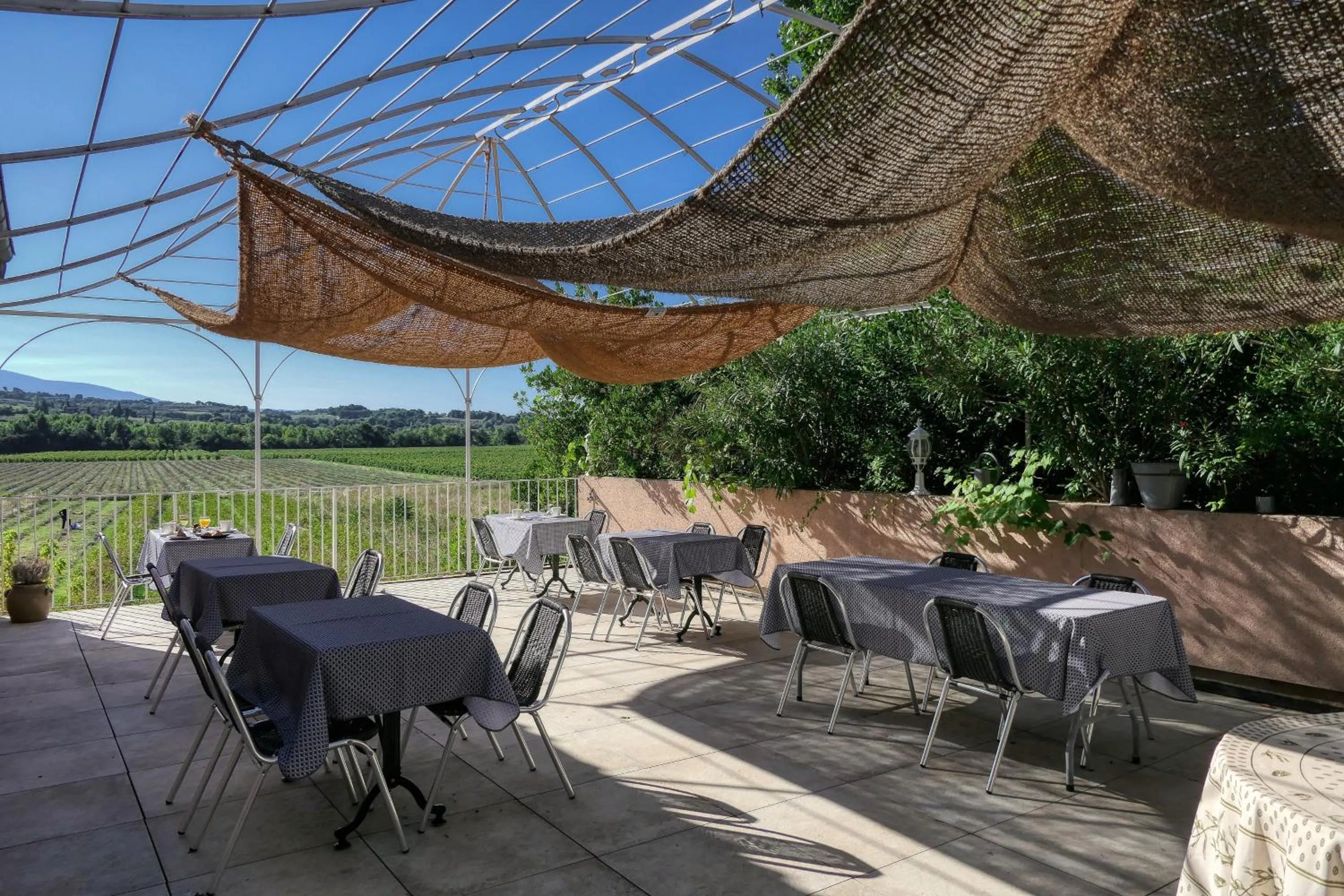 Patio in Logis Hôtel La Bastide des Monges