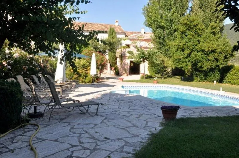 Swimming pool in Logis Hôtel La Bastide des Monges