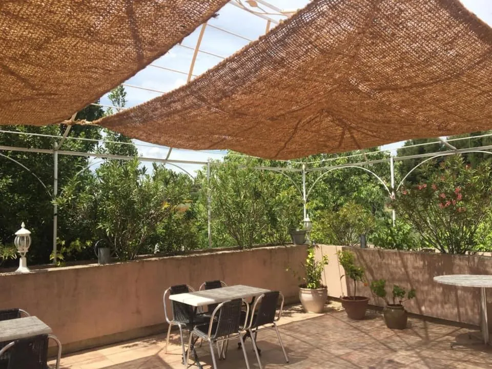 Patio in Logis Hôtel La Bastide des Monges