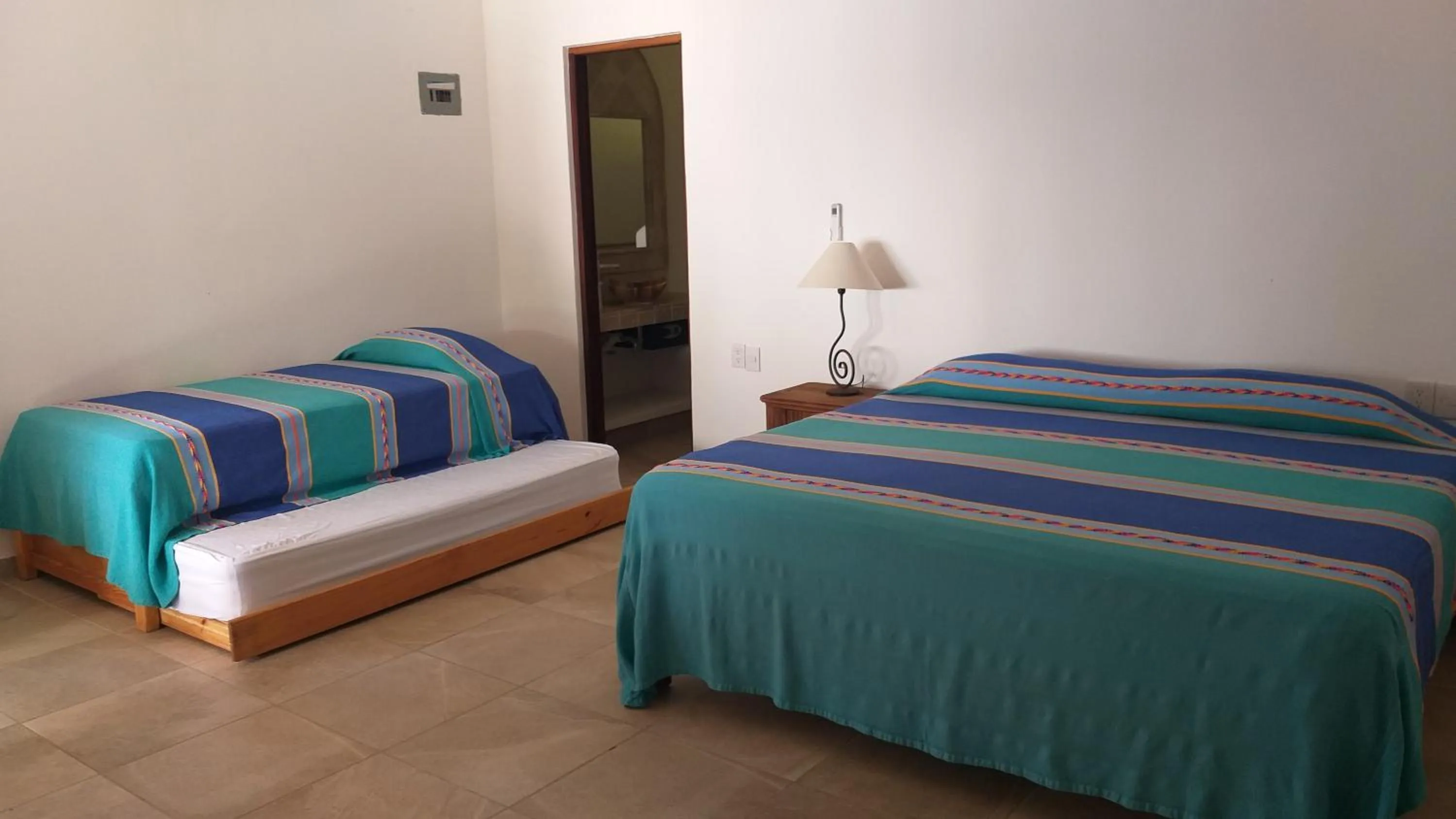 Photo of the whole room, Bed in Bungalows Lydia San Pancho