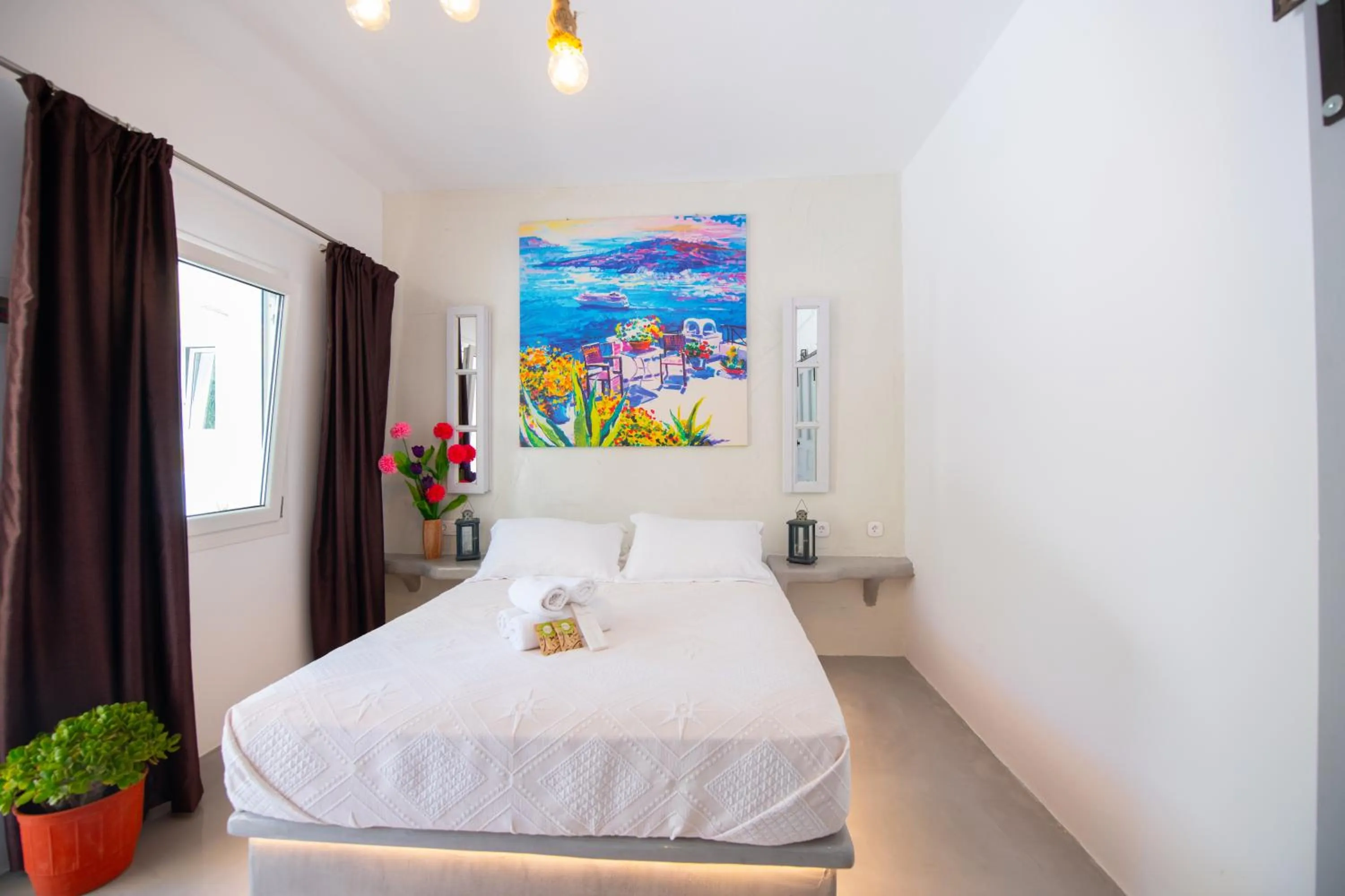 Bed in Arlene Suites