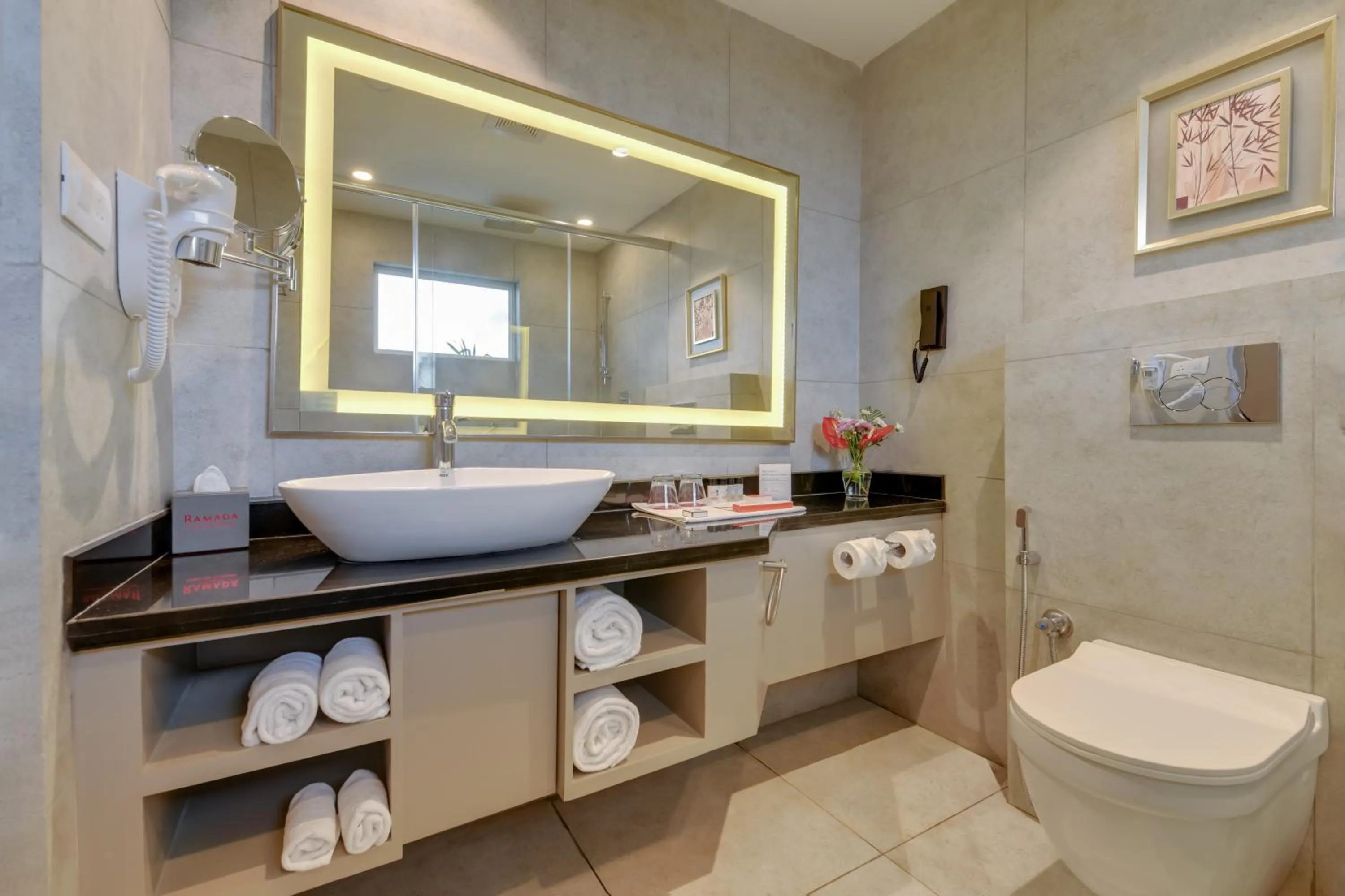 Bathroom in Ramada by Wyndham Bengaluru Yelahanka