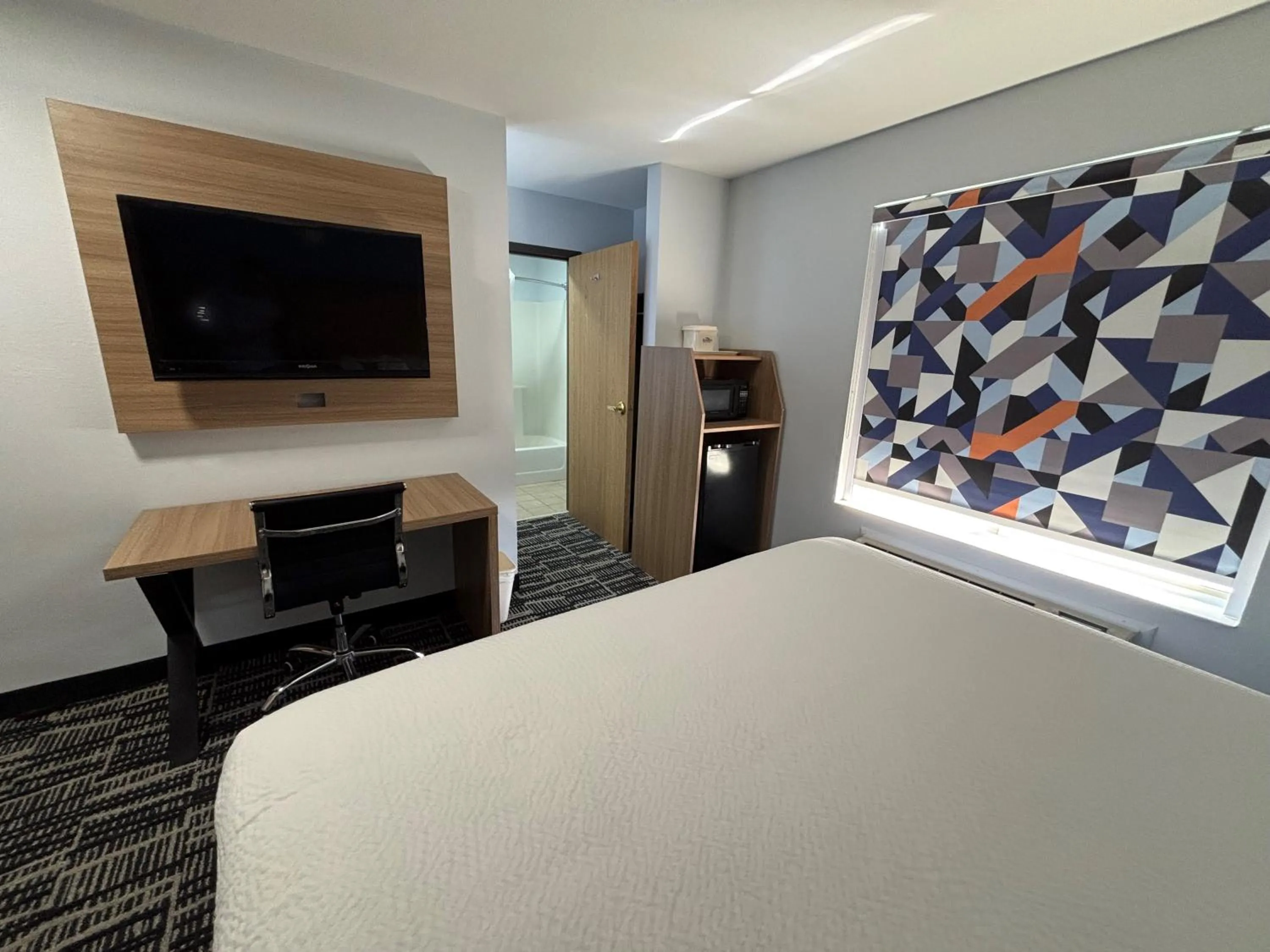 Bed in Baymont by Wyndham Jacksonville