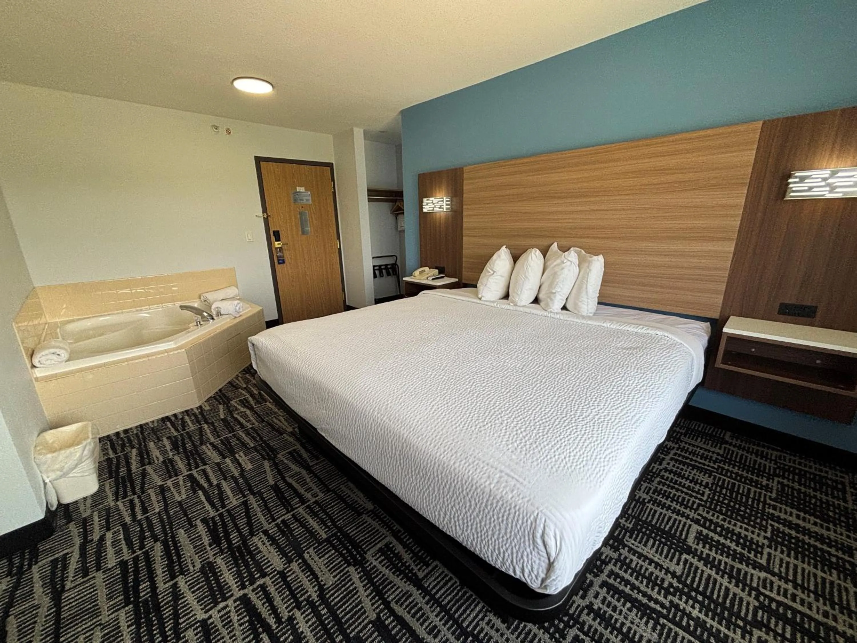 Bed in Baymont by Wyndham Jacksonville