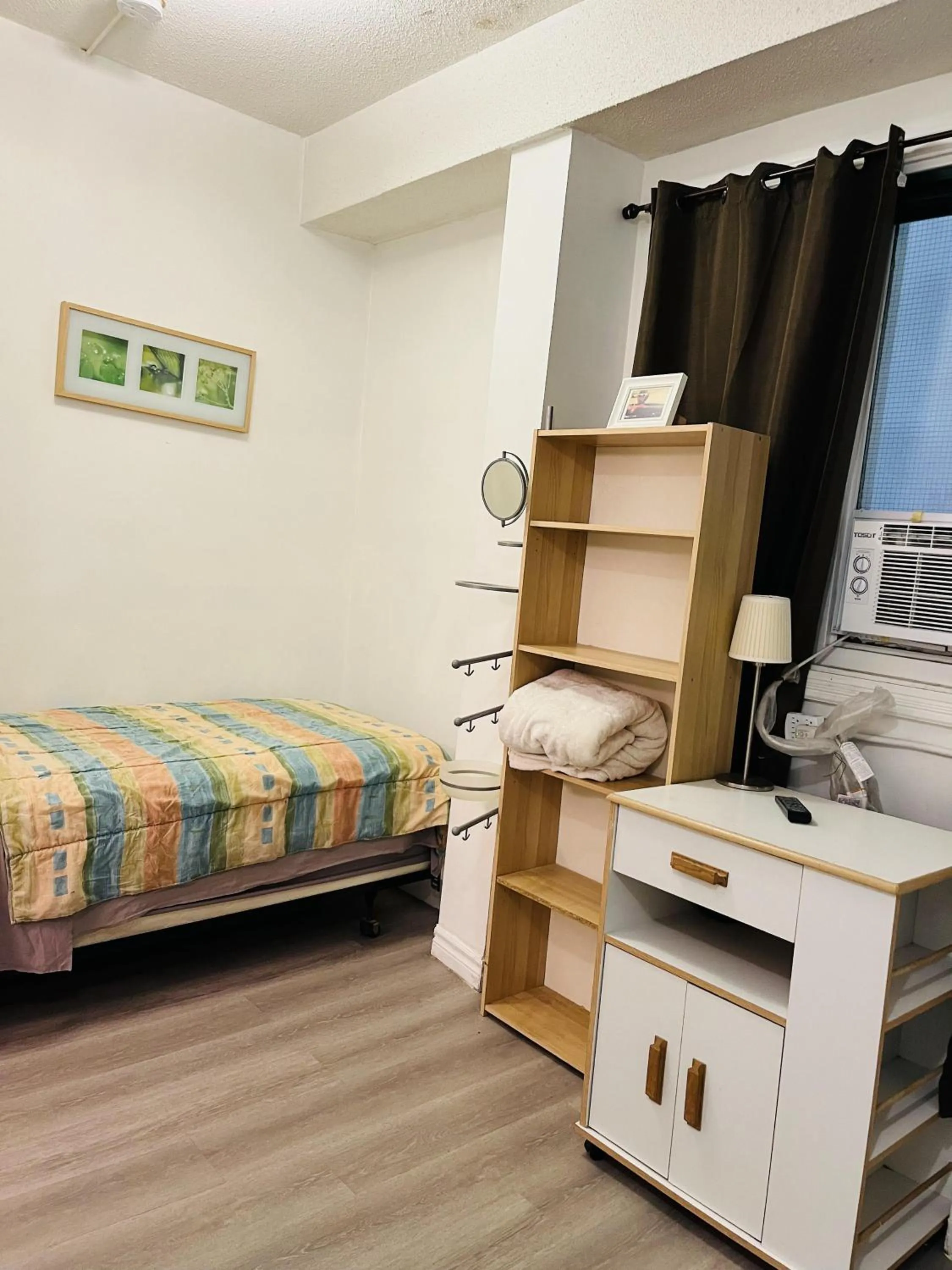 Bed in Saint Lawrence Residences and Suites