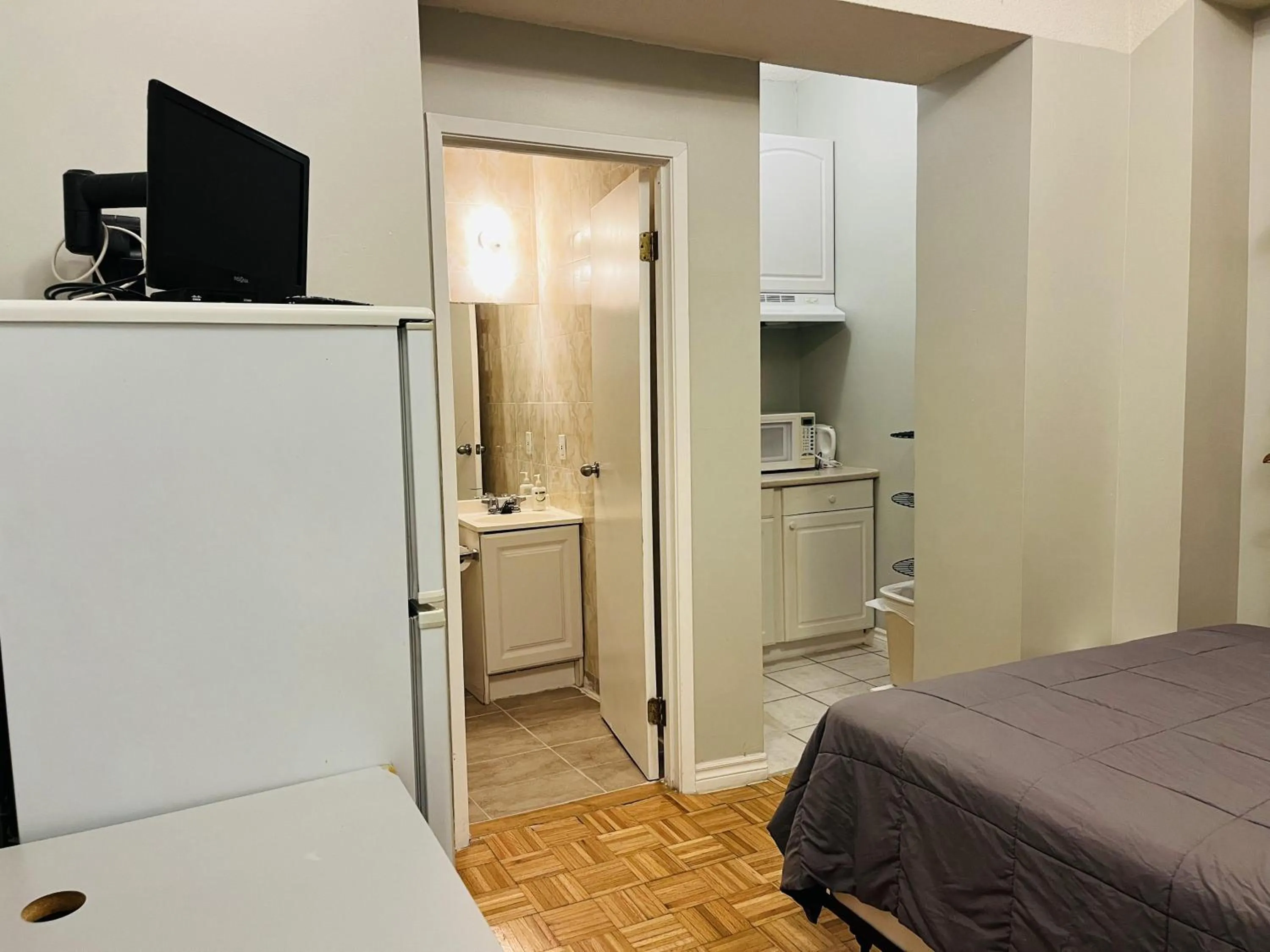 Bed in Saint Lawrence Residences and Suites