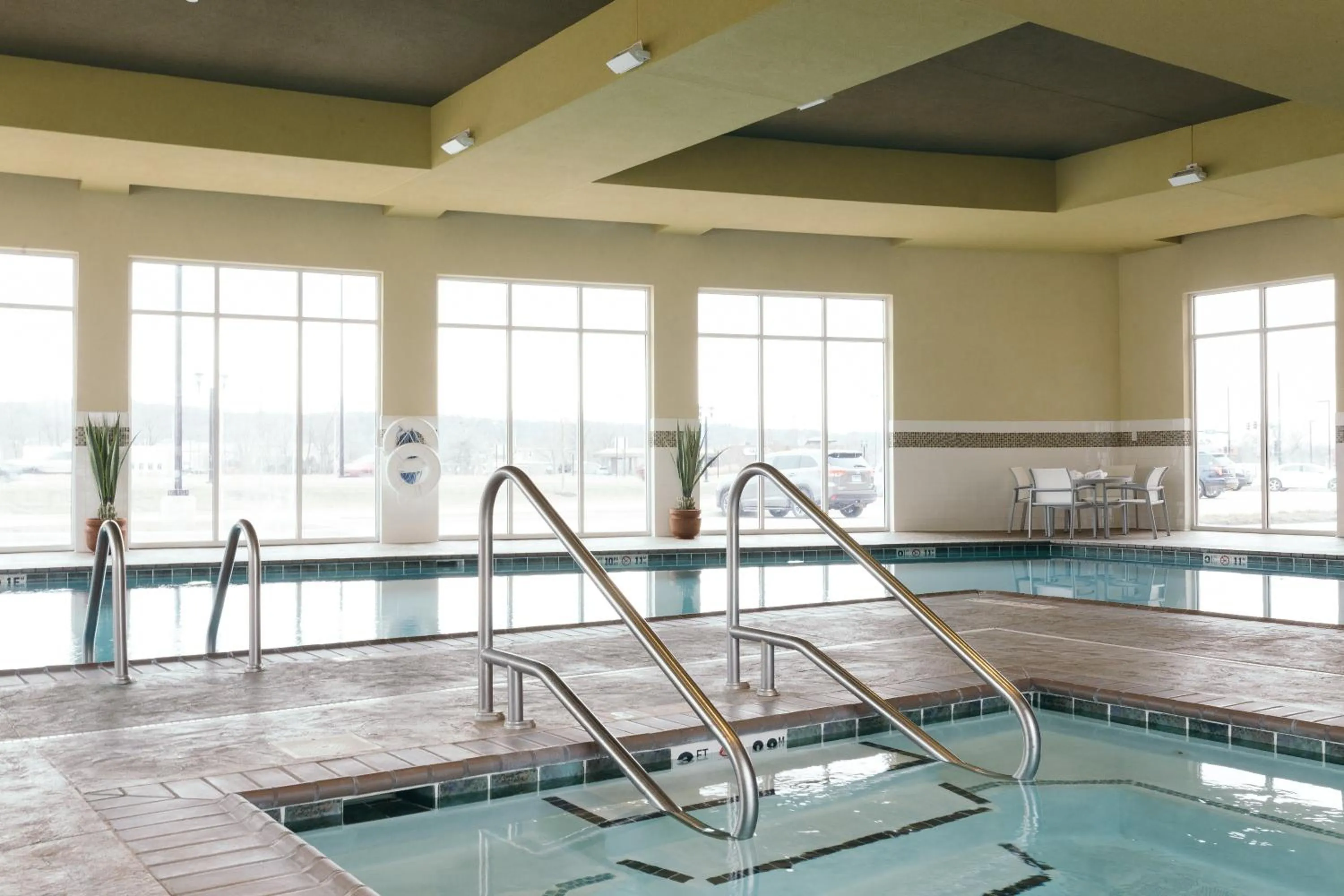 Swimming pool in Holiday Inn and Suites East Peoria by IHG