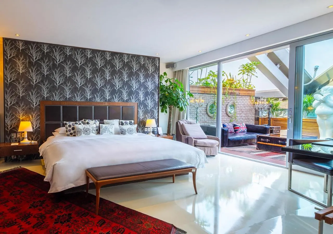 Bed in Hotel Éclat Beijing