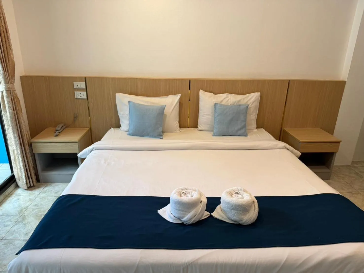 Bed in Blue Garden Resort Pattaya