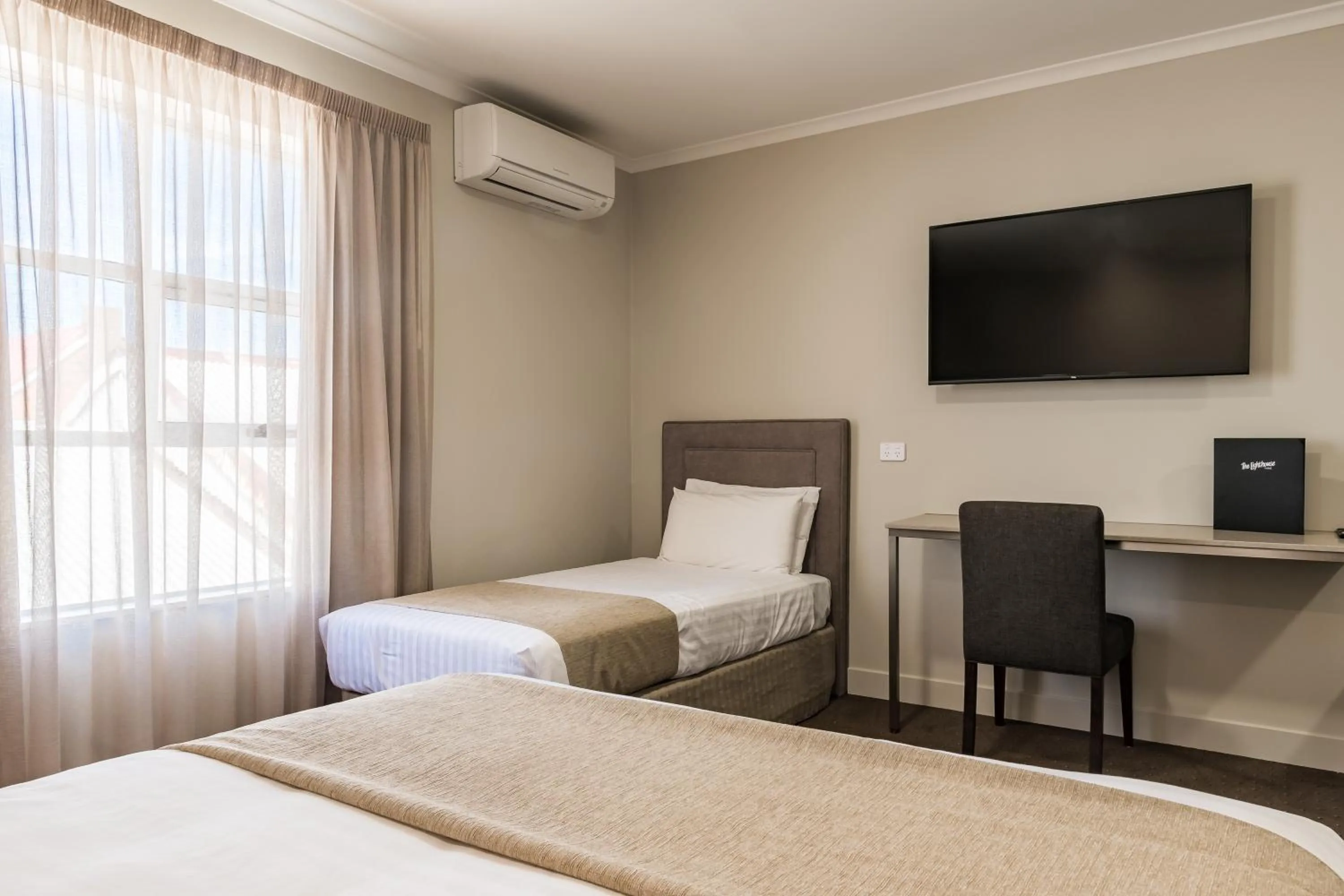 TV and multimedia, Bed in The Lighthouse Hotel