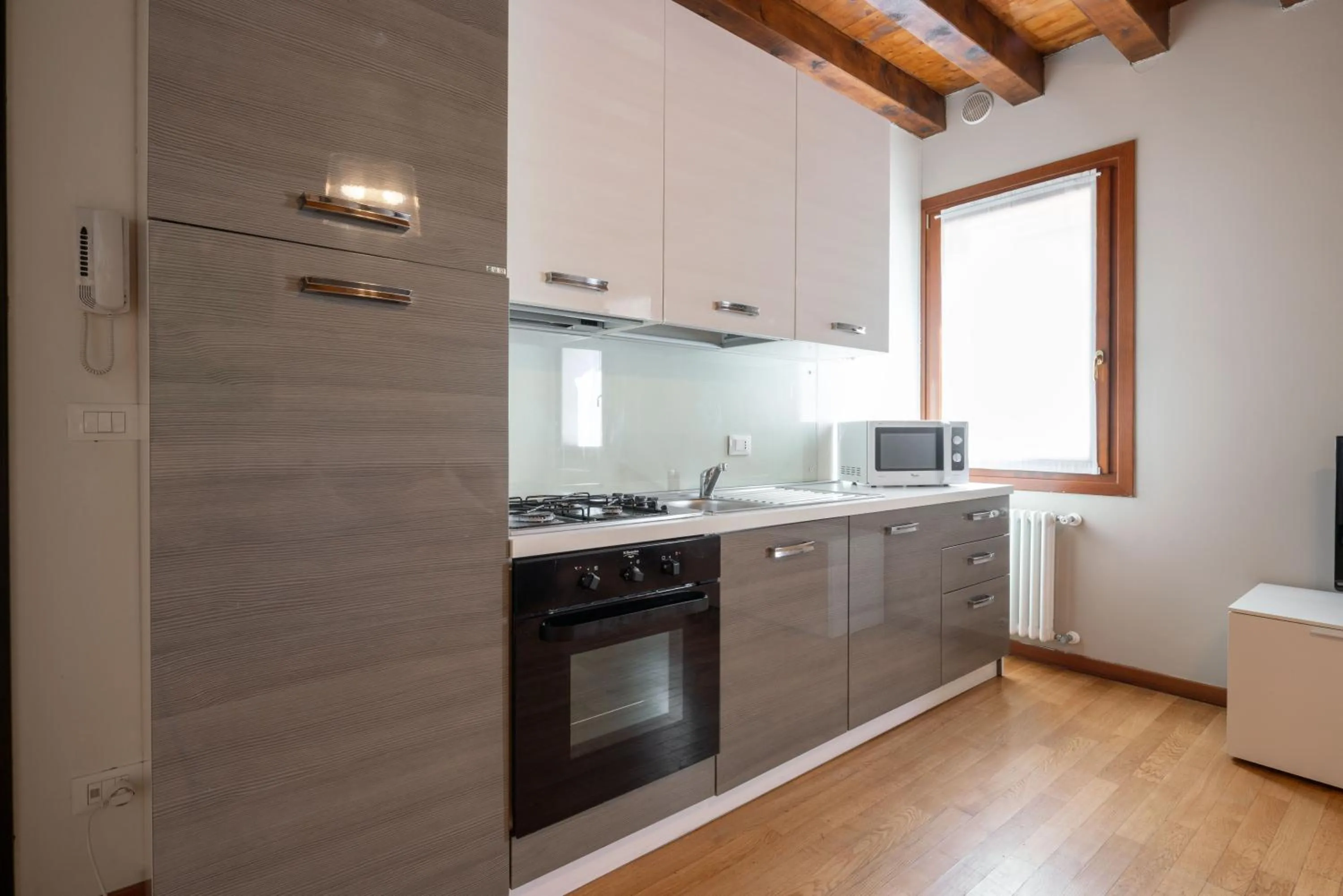 Kitchen or kitchenette in Design Palace Apartment by Wonderful Italy