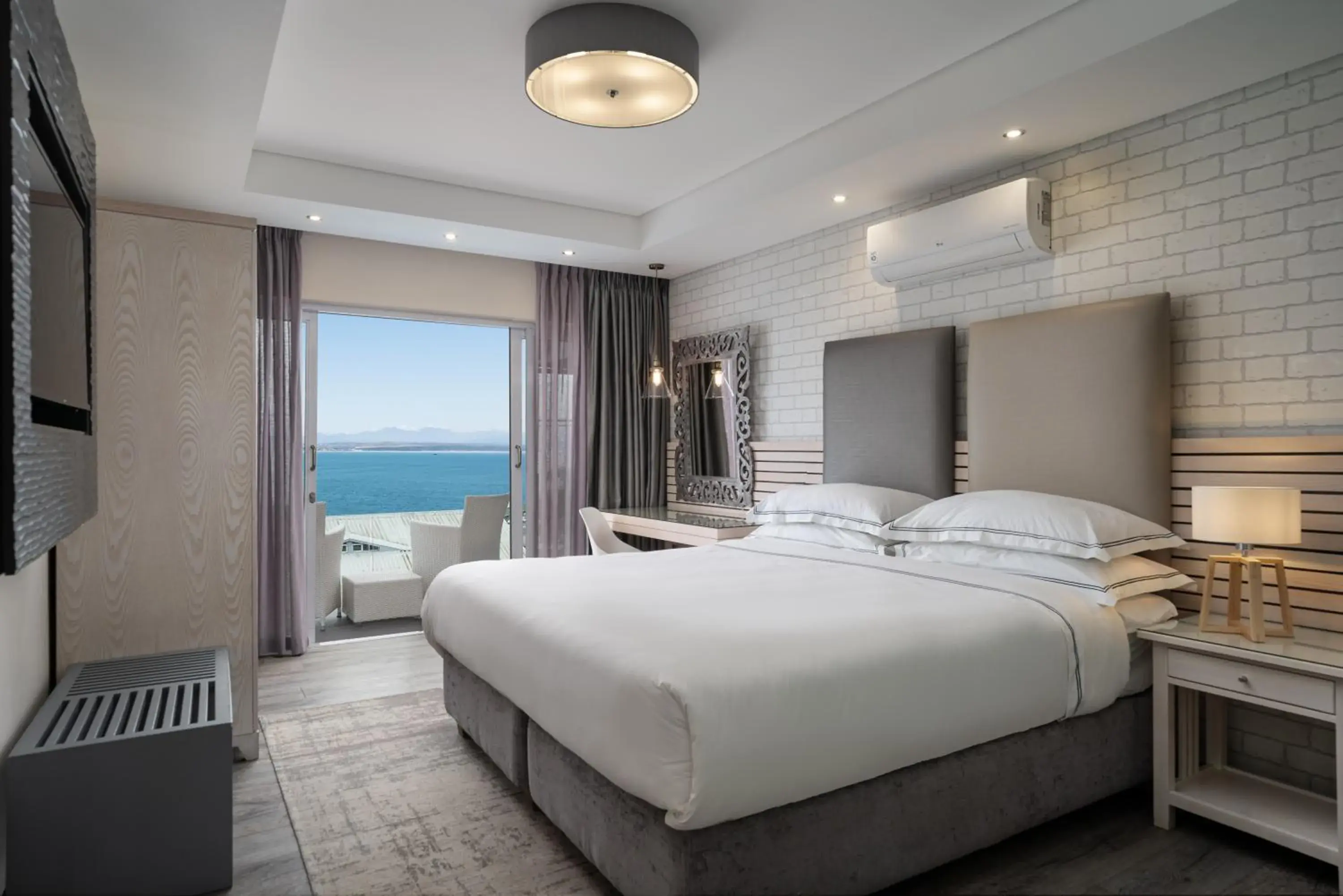 Larger Guest room, 1 King, Harbor view, Balcony - single occupancy in Protea Hotel by Marriott Mossel Bay Larger Guest room, 1 King, Harbor view, Balcony - single occupancy in Protea Hotel by Marriott Mossel Bay