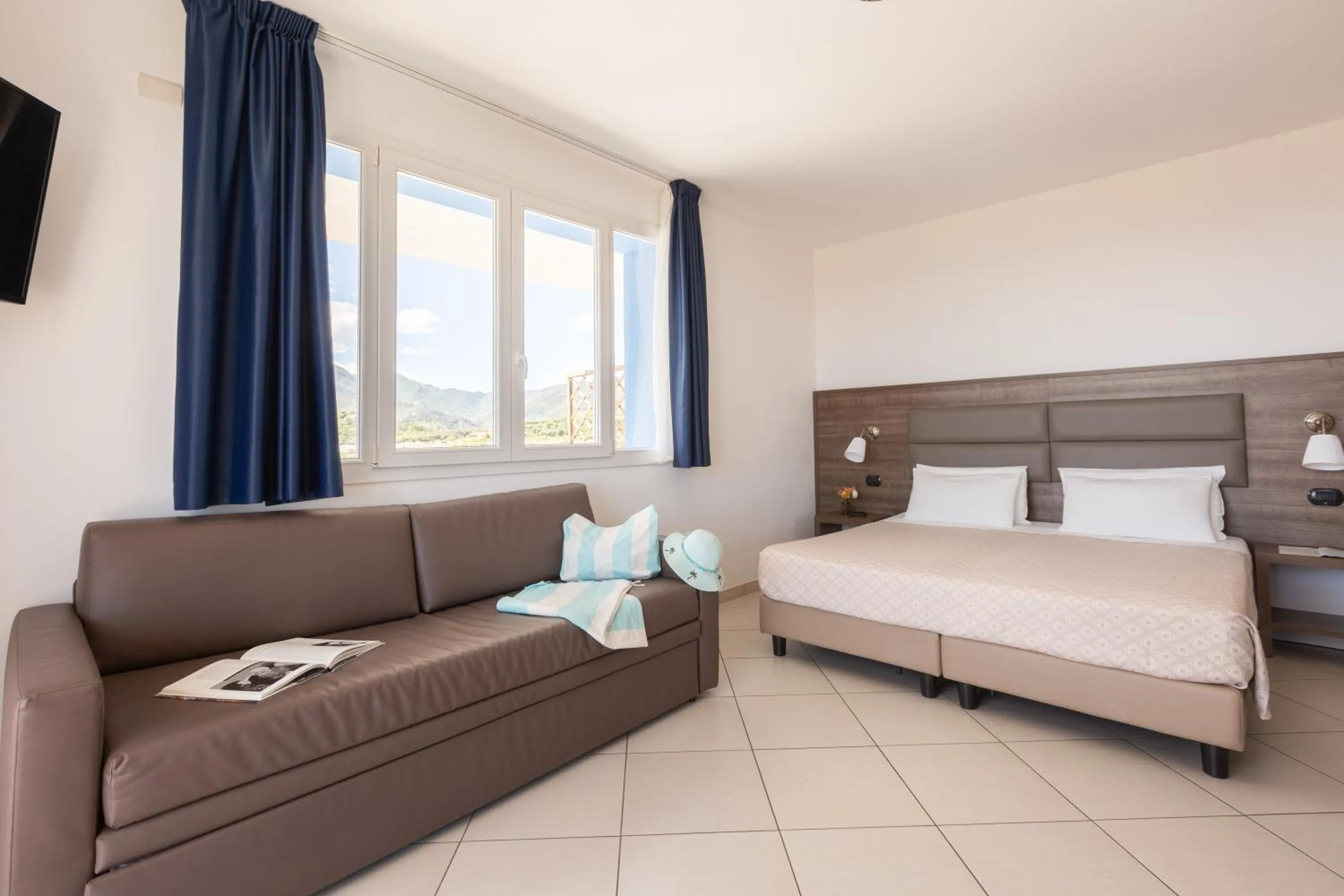 Bed in Ai Pozzi Village Resort & SPA