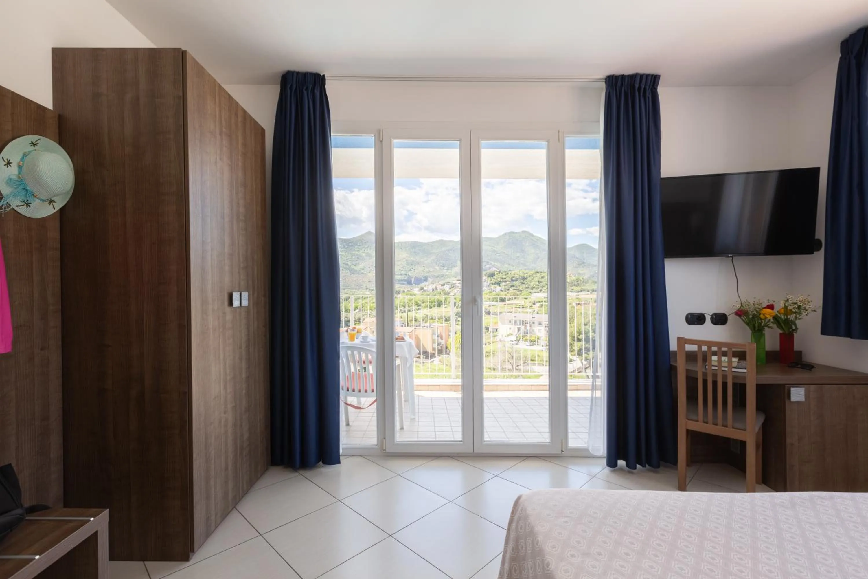 Bed in Ai Pozzi Village Resort & SPA