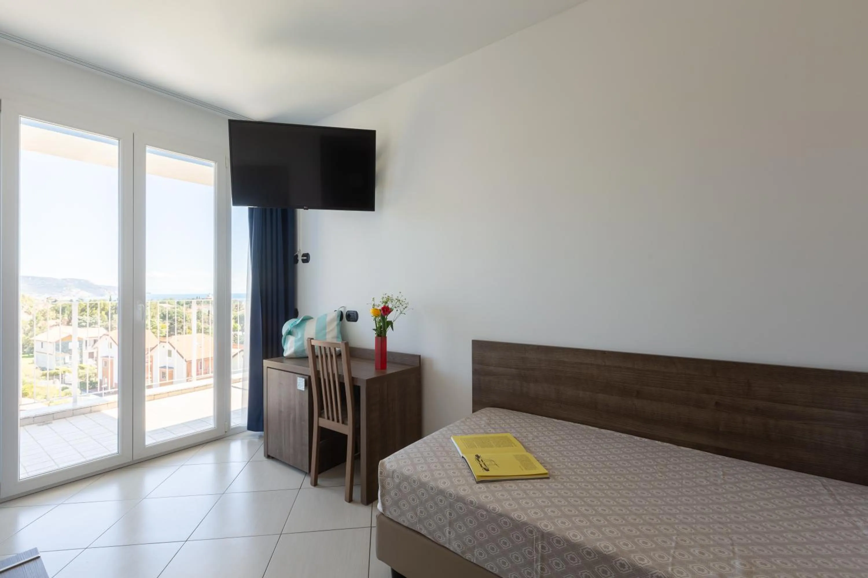 Bed in Ai Pozzi Village Resort & SPA