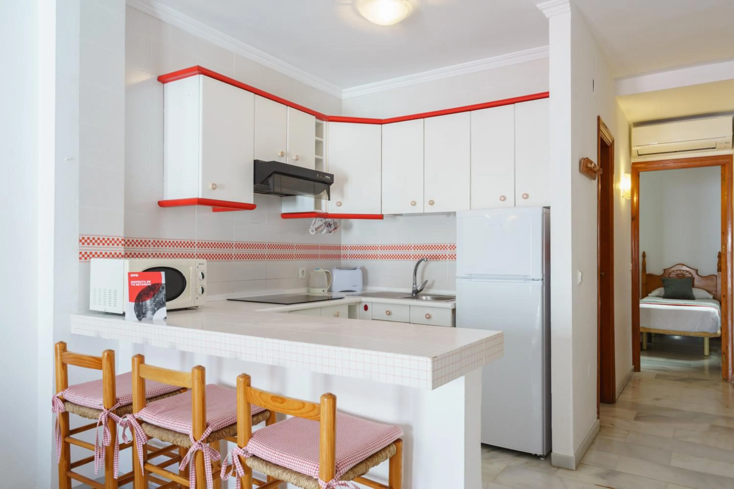 Kitchen or kitchenette in Apartamentos Pepe Mesa