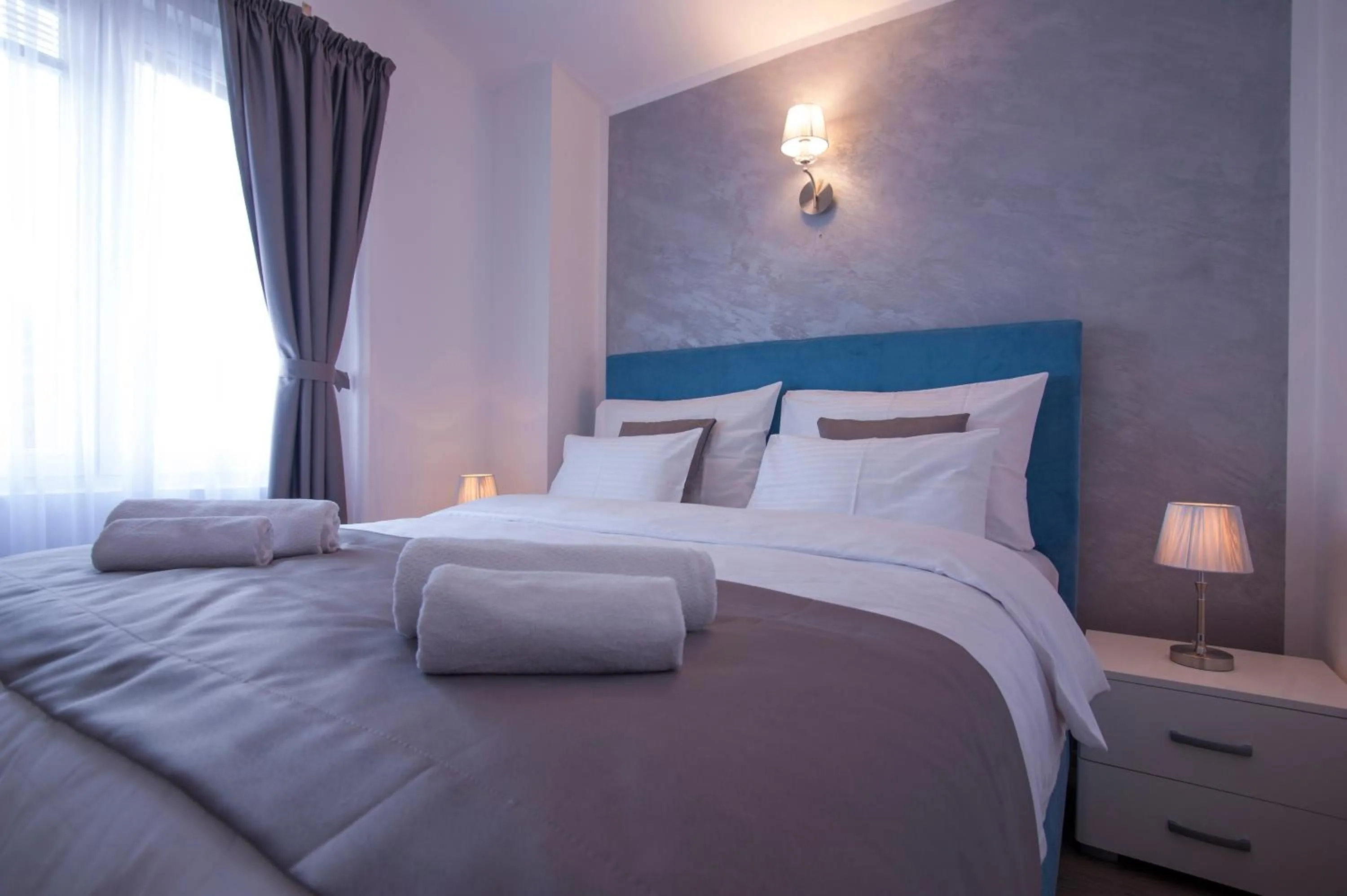 Bedroom, Bed in Apartments Grand