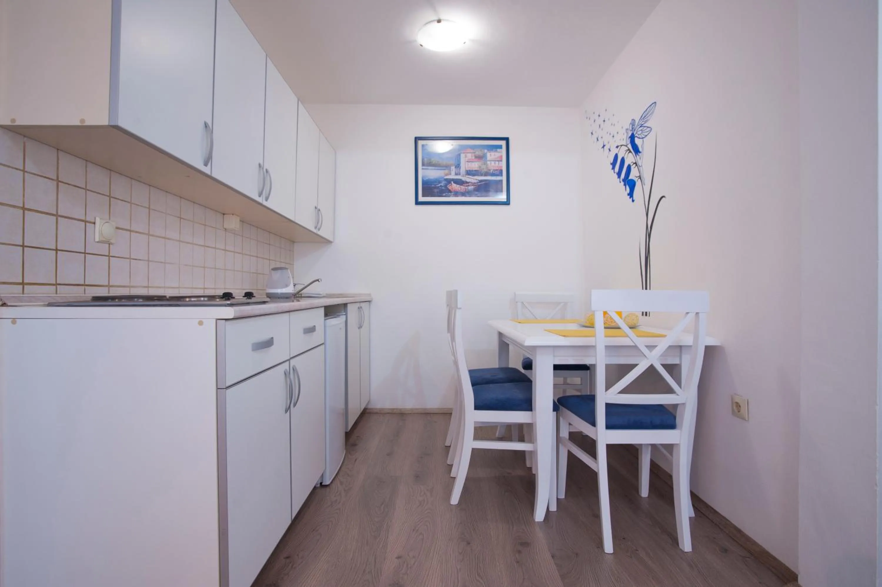 Kitchen or kitchenette in Apartments Grand