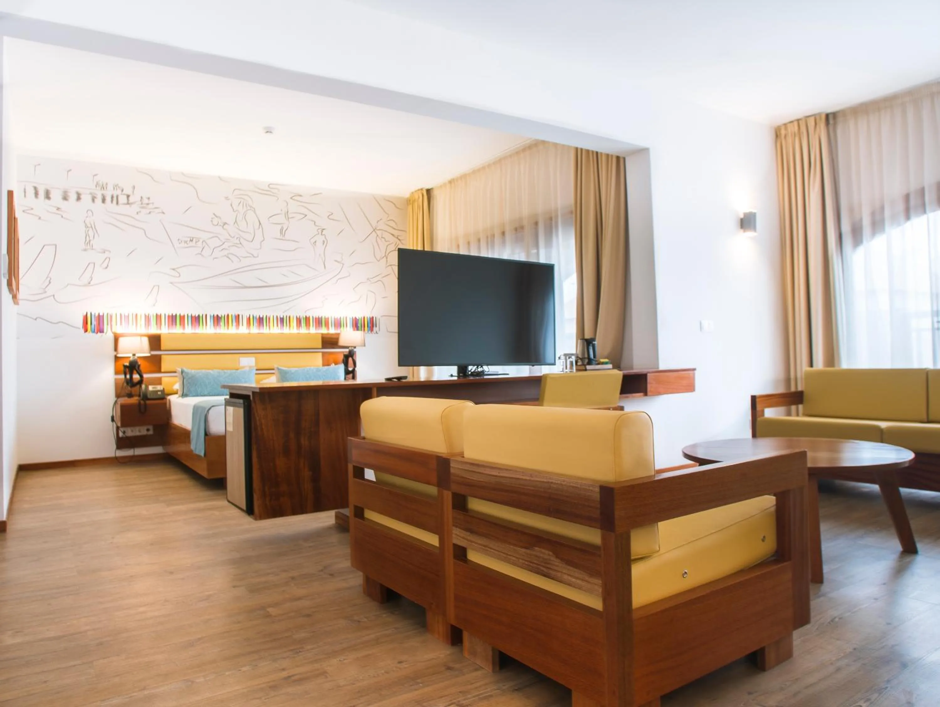 Communal lounge/ TV room in Hotel Odjo d'água